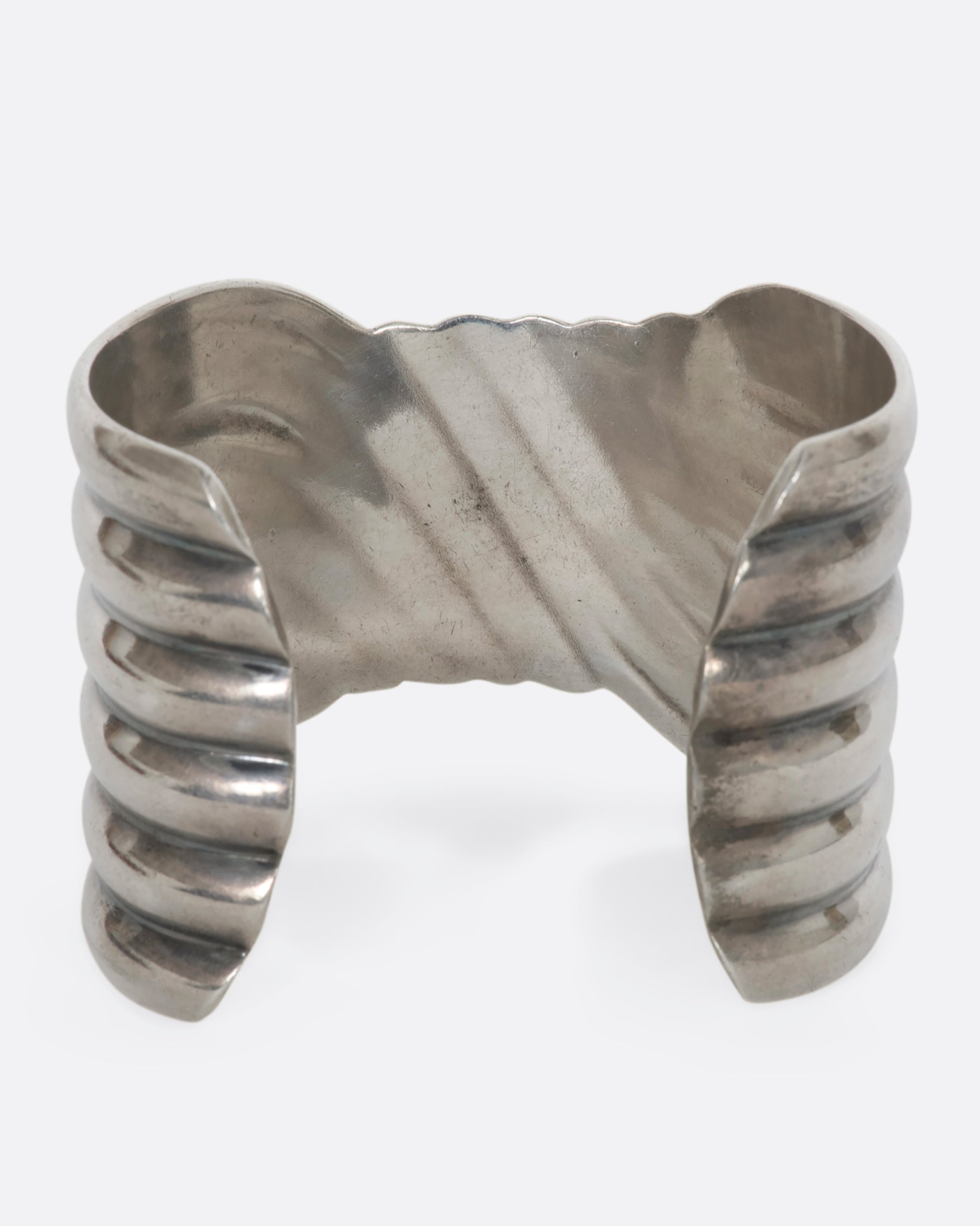 Sterling silver wavy line cuff. View from the back.