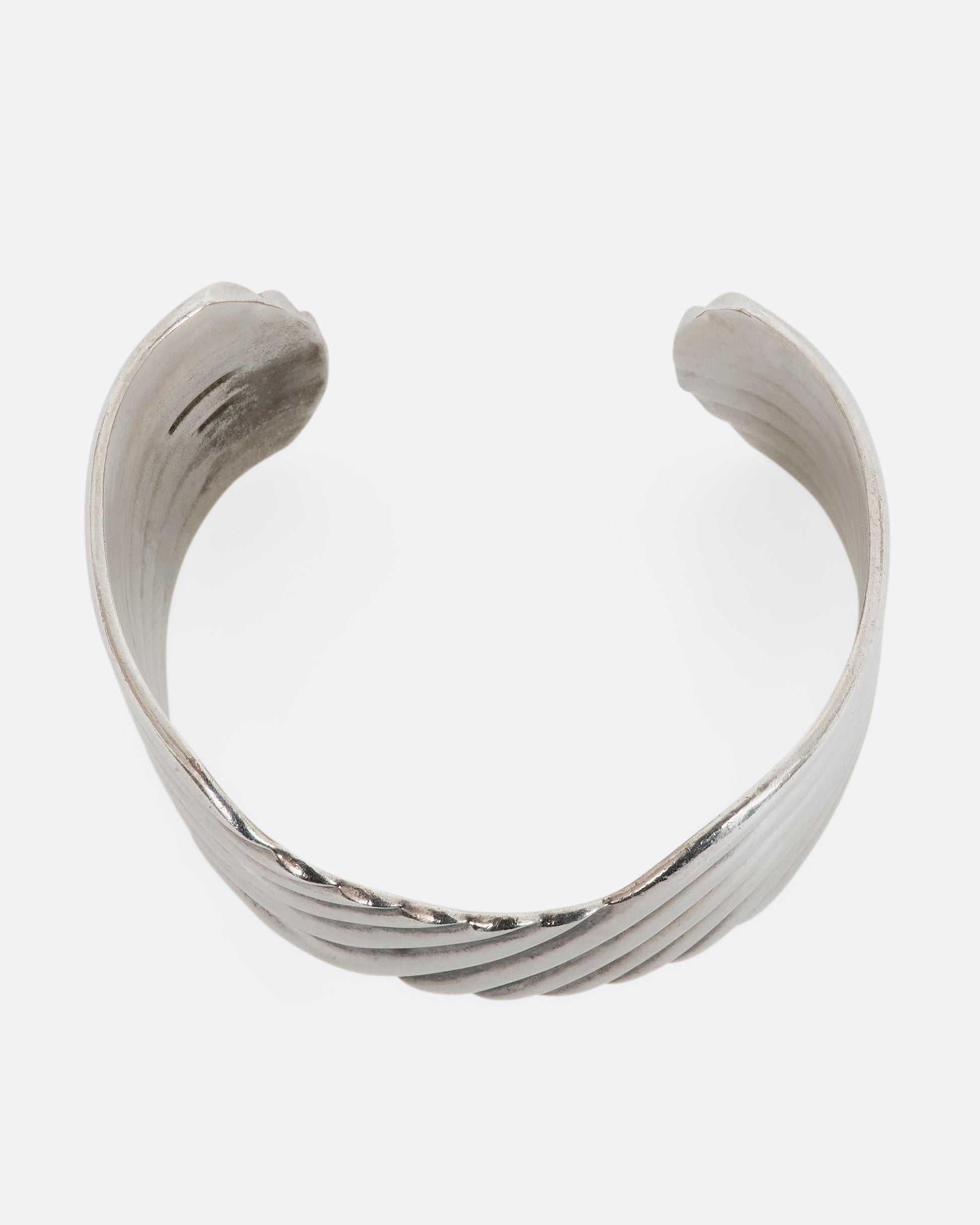 Sterling silver wavy line cuff. View from the above.