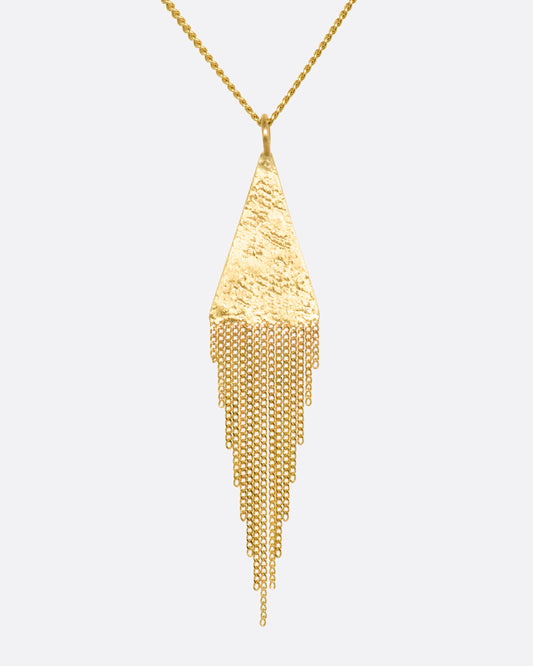 A yellow gold necklace with a fringed triangle pendant. View up close from the front.