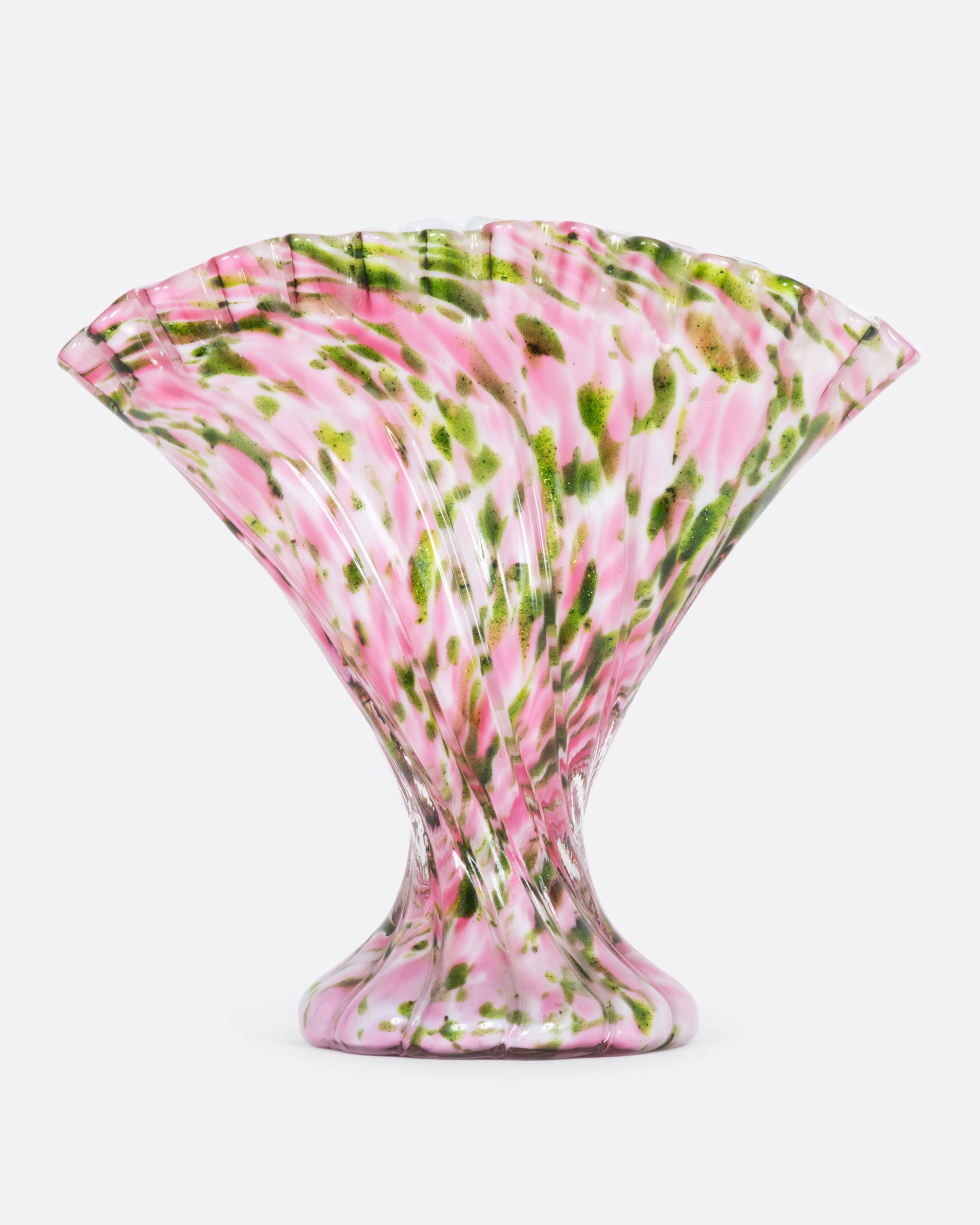 Rippled pink glass vase with green aventurine splatter. View from the front.