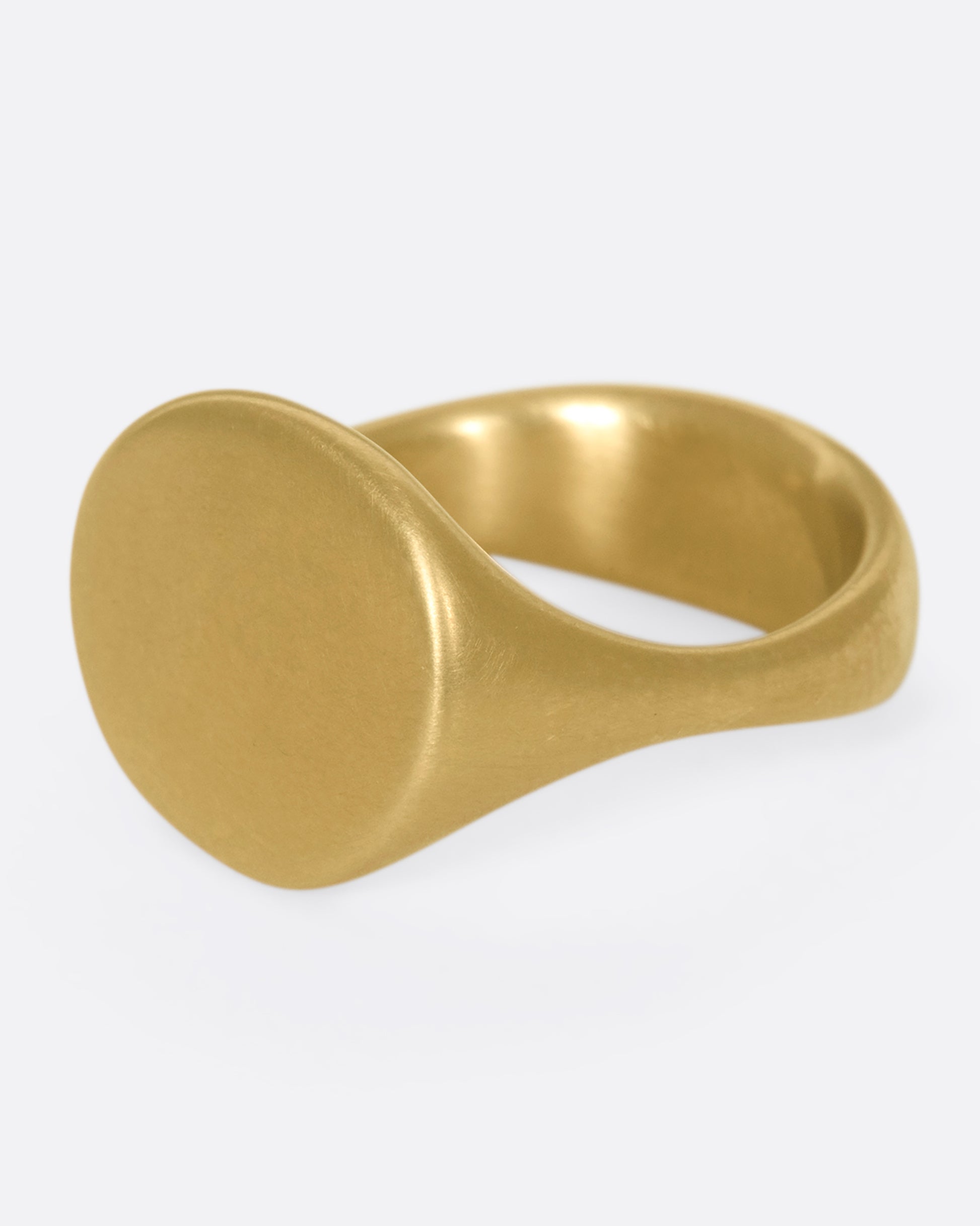 This solid 14k gold oval signet ring is incredibly soft and comfortable. The band is perfectly weighted, so the signet never falls to the side.