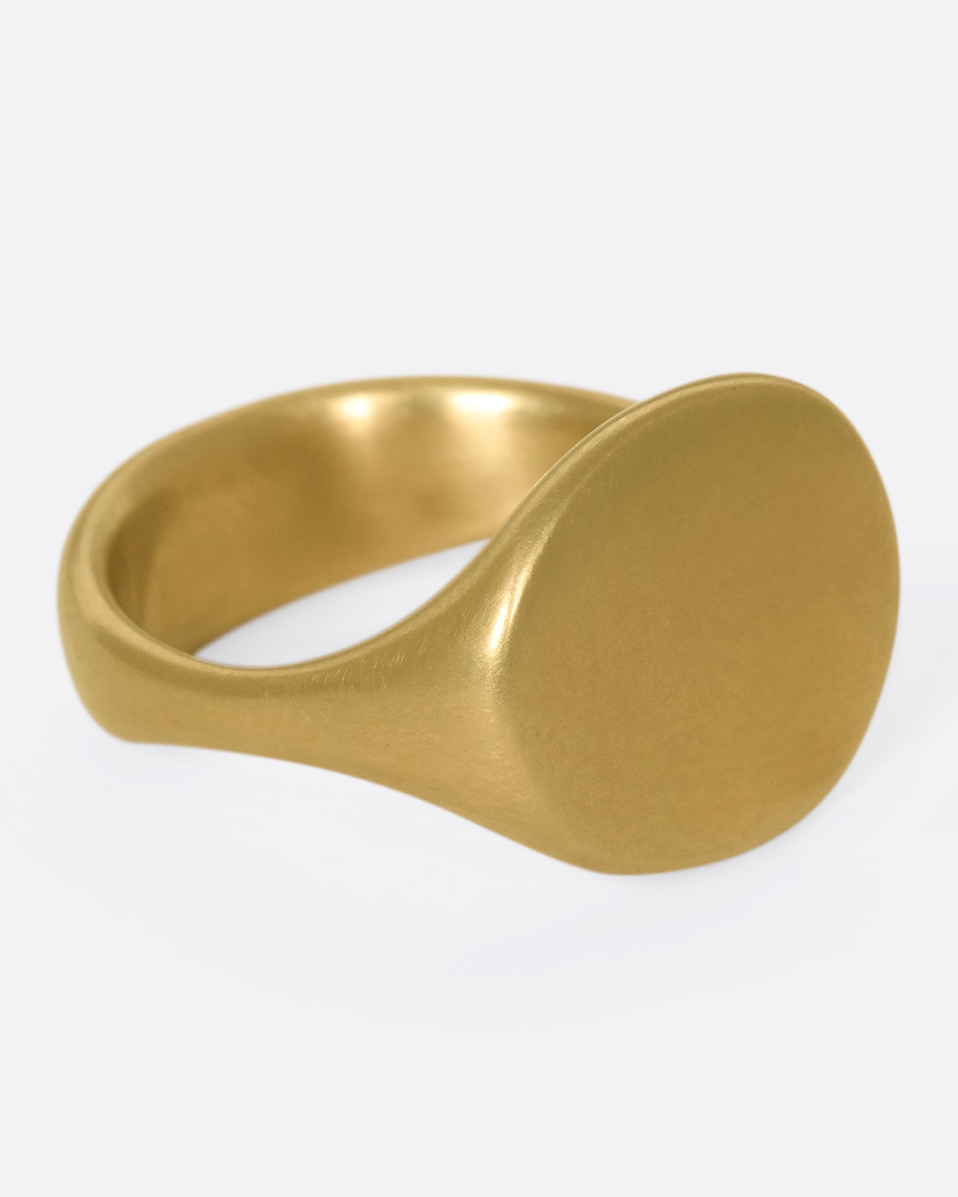 This solid 14k gold oval signet ring is incredibly soft and comfortable. The band is perfectly weighted, so the signet never falls to the side.