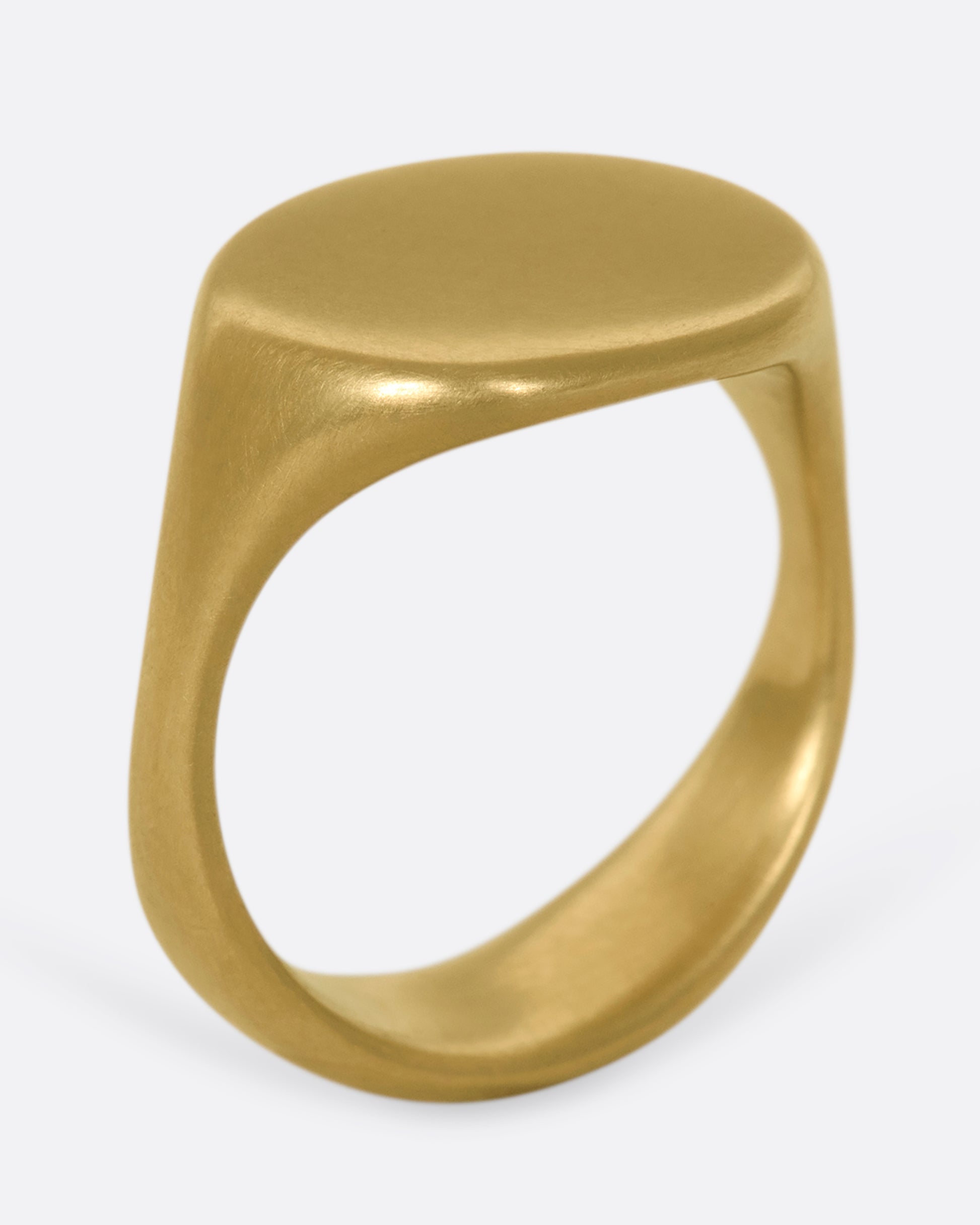 This solid 14k gold oval signet ring is incredibly soft and comfortable. The band is perfectly weighted, so the signet never falls to the side.