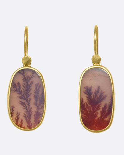 Yellow gold dendritic agate drop earrings, the pair from the front showing the purple and orange fern patterns