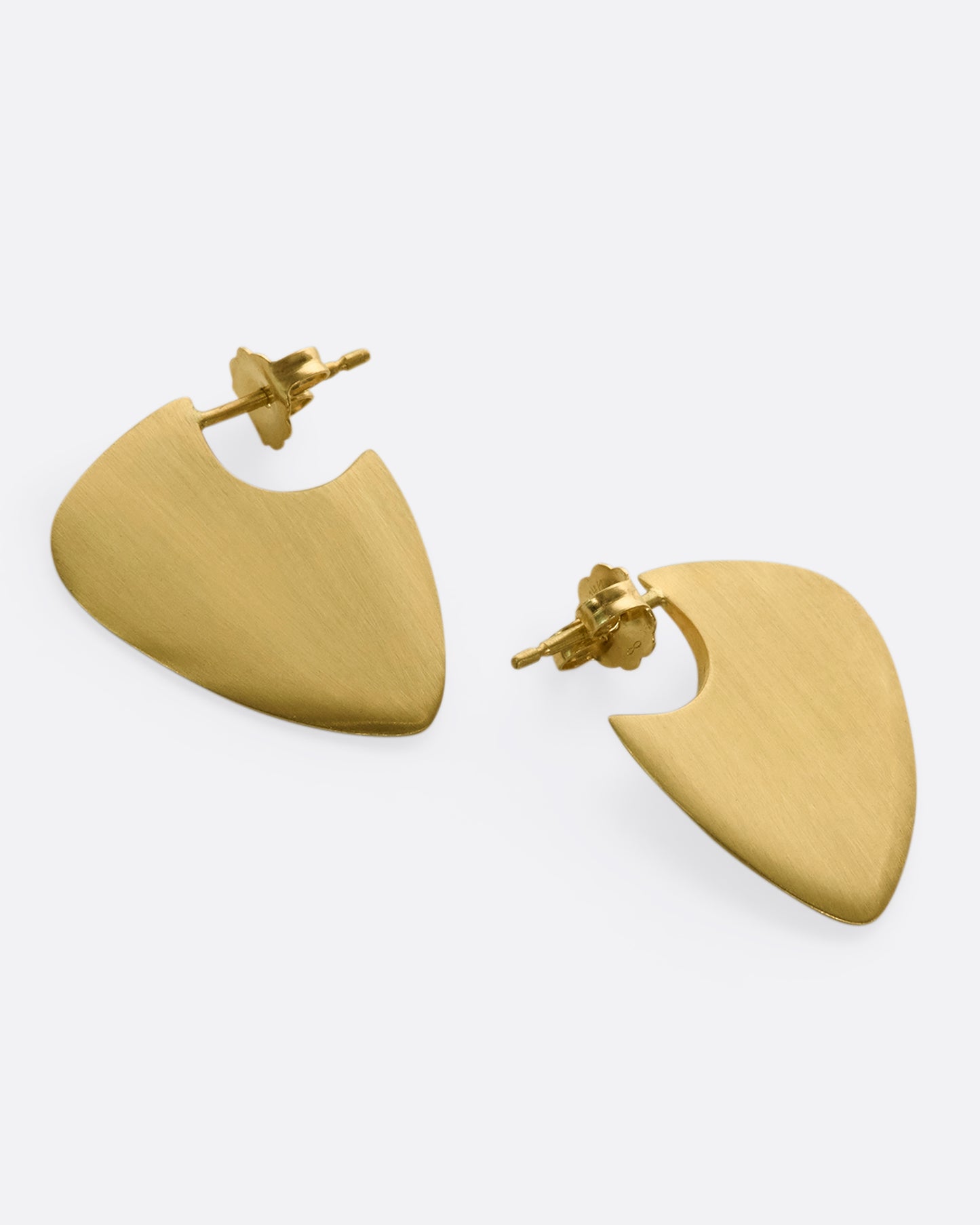 A pair of 10k solid gold hoop earrings with a guitar pick shape.