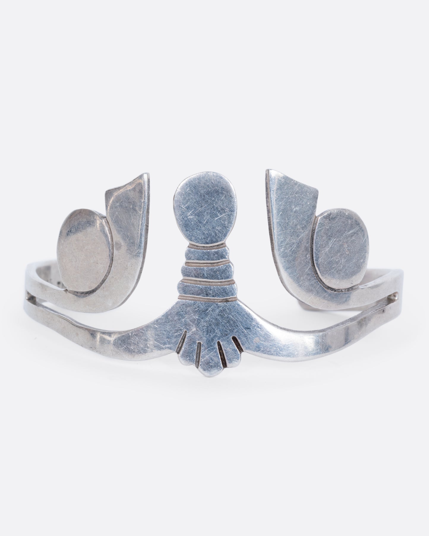 A sterling silver cuff with Egyptian motif. View from the front.