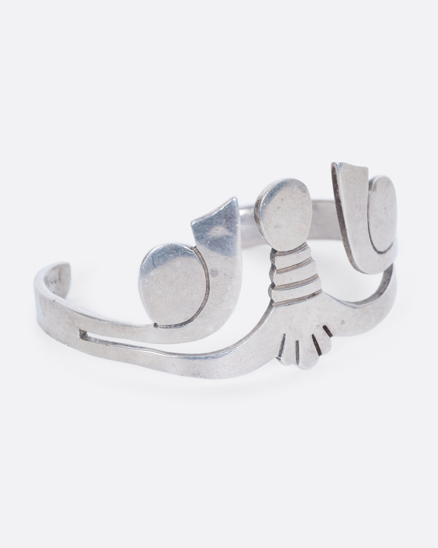 A sterling silver cuff with Egyptian motif. View from the alternate side.