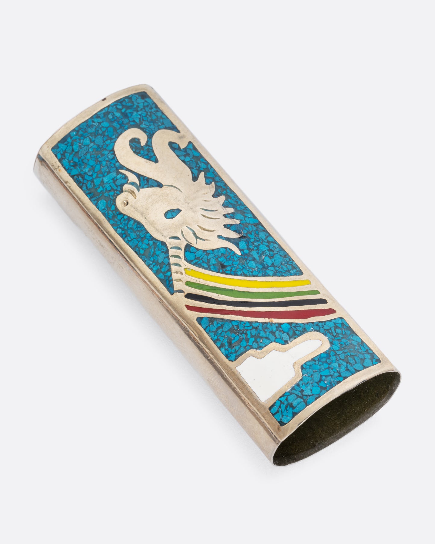 An alpaca silver lighter cover with a unicorn and rainbow. View laying flat.