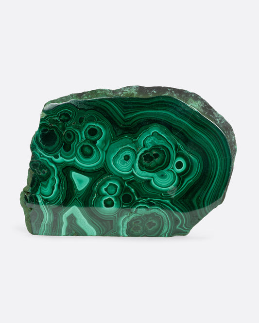 A slab of lush malachite shown from the front.
