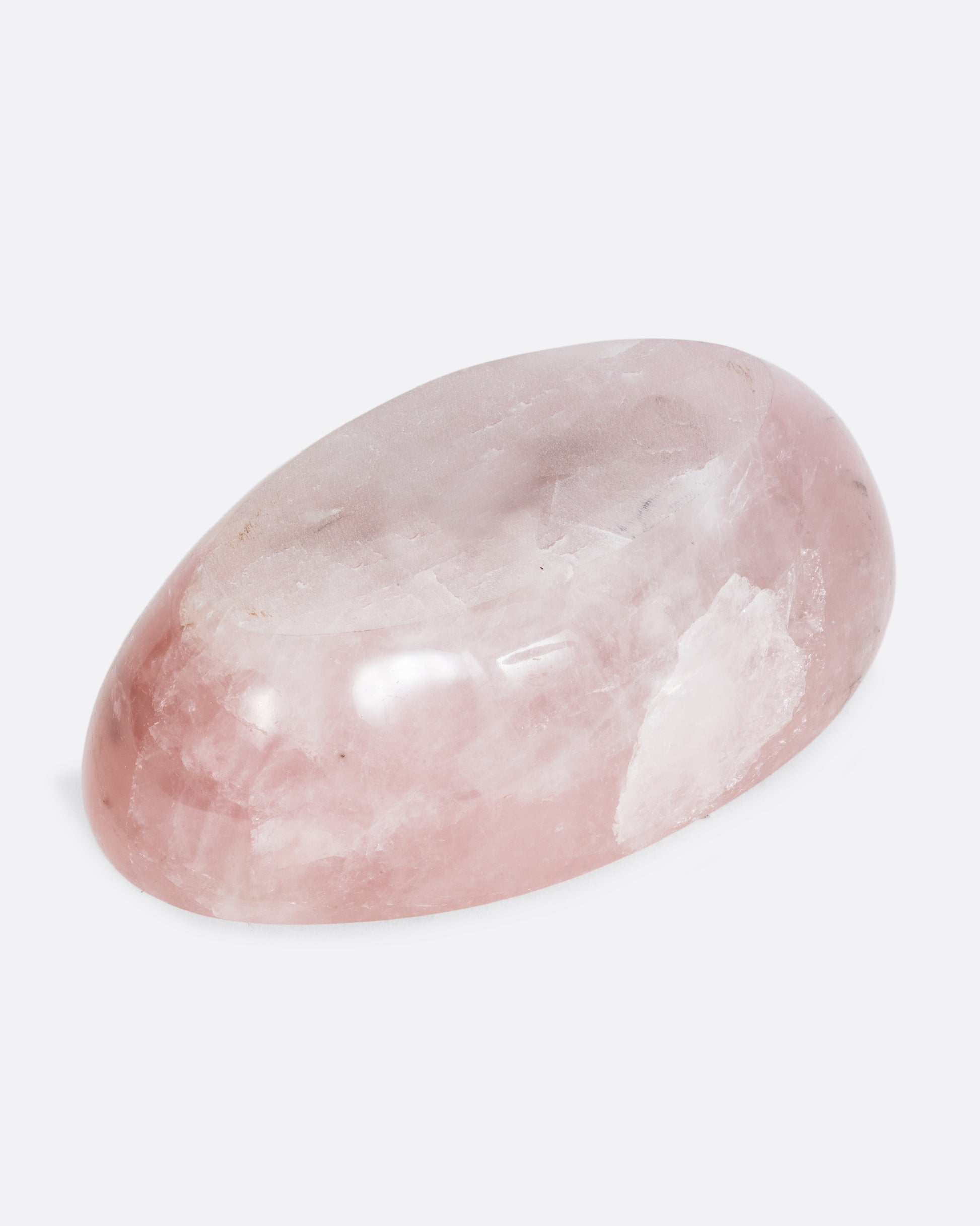 A rose quartz bowl, shown from the underside.