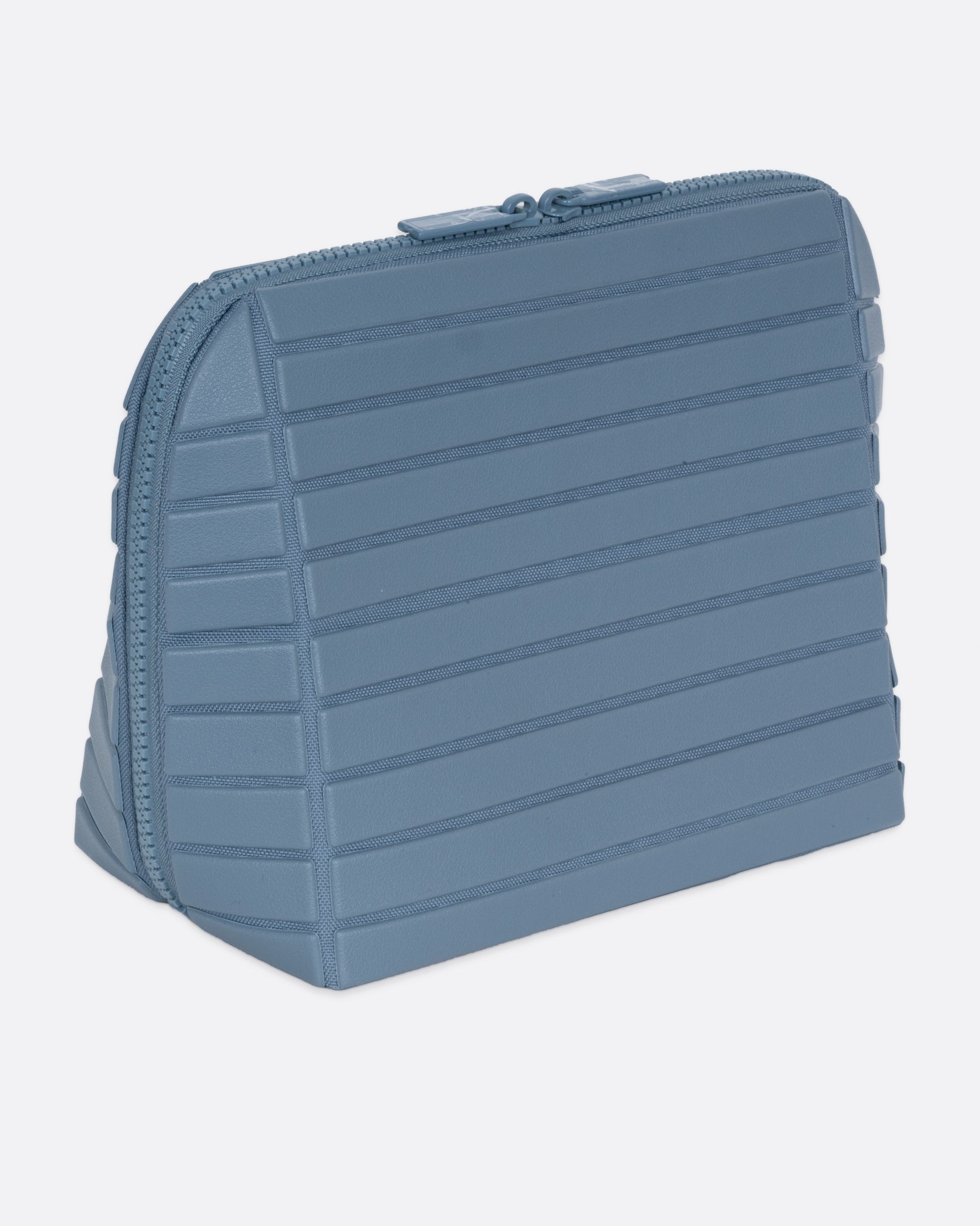 A blue textured rectangular pouch, shown from the side.