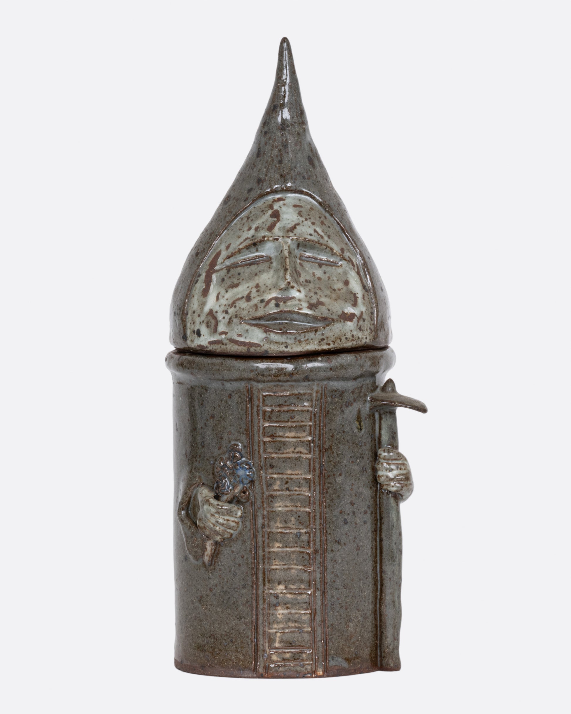 A this ceramic likeness of Saint Fiacre with a removable lid, shown from the front.