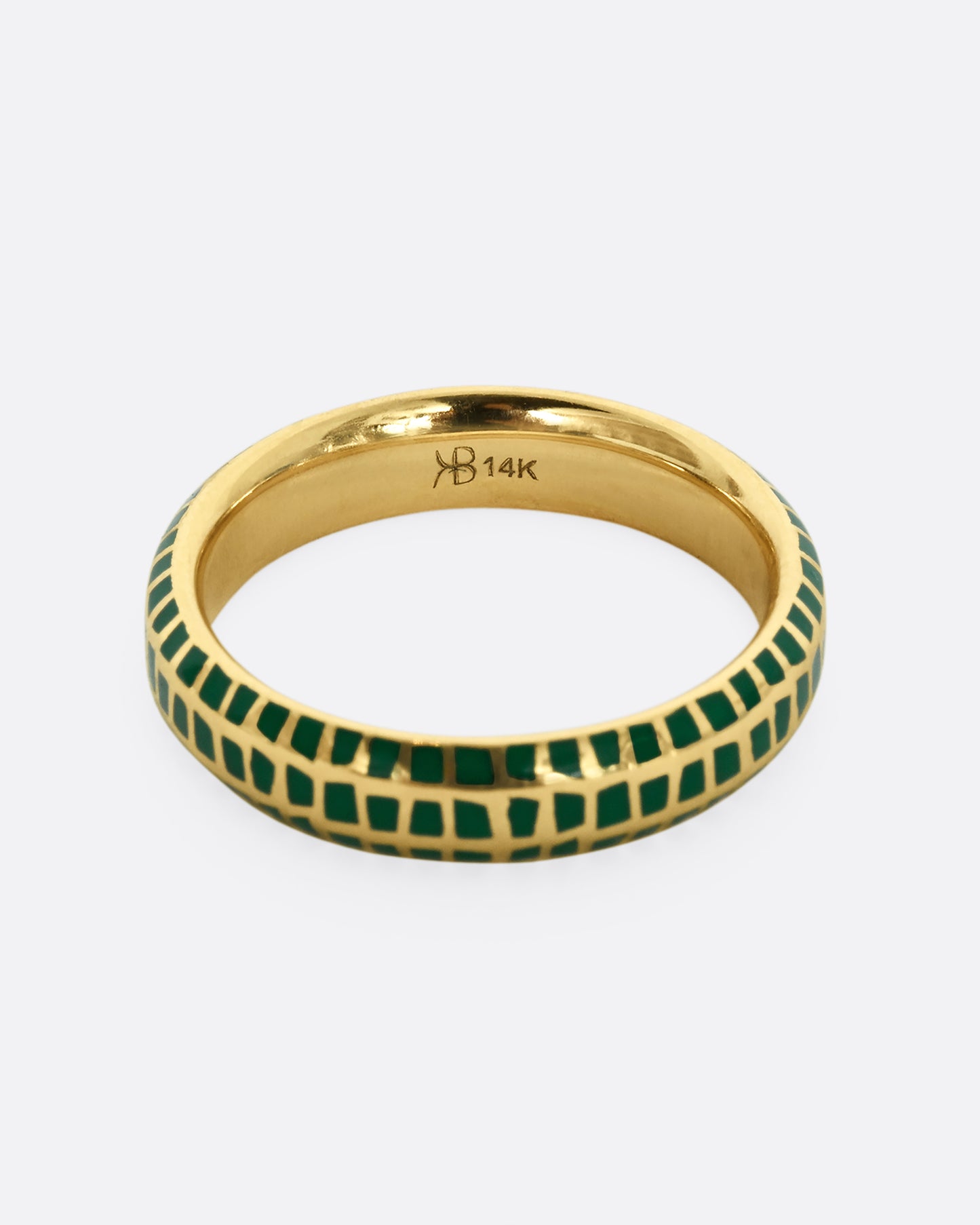 A yellow gold band with an irregular checkered pattern all the way around. 