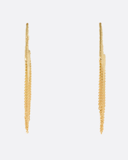 A pair of yellow gold stud back angular earrings with fine cable chain fringe, shown from the front.