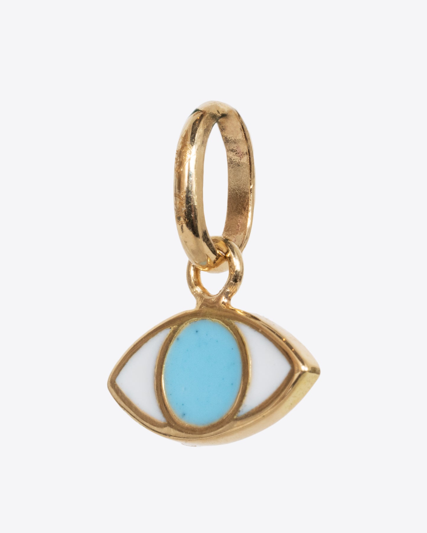 A yellow gold eye charm with turquoise blue and white. Shown from the side.