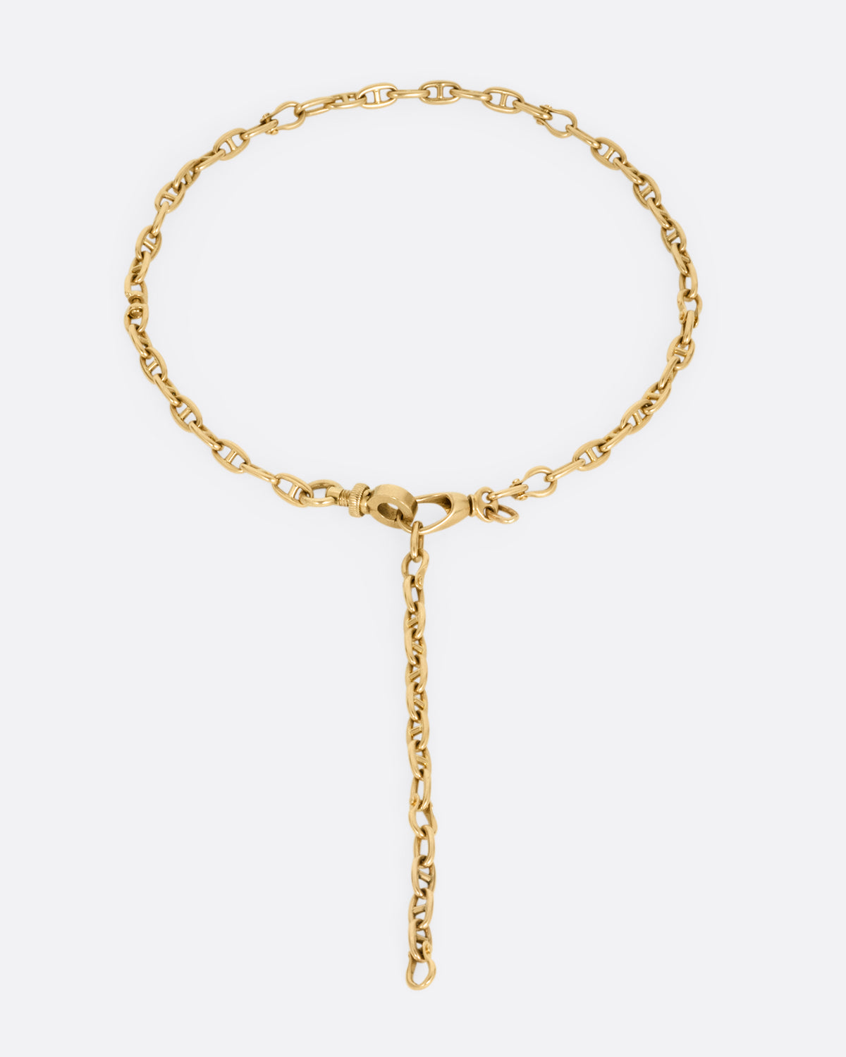 A rose gold mariner watch chain necklace, shown with the clasp in front.