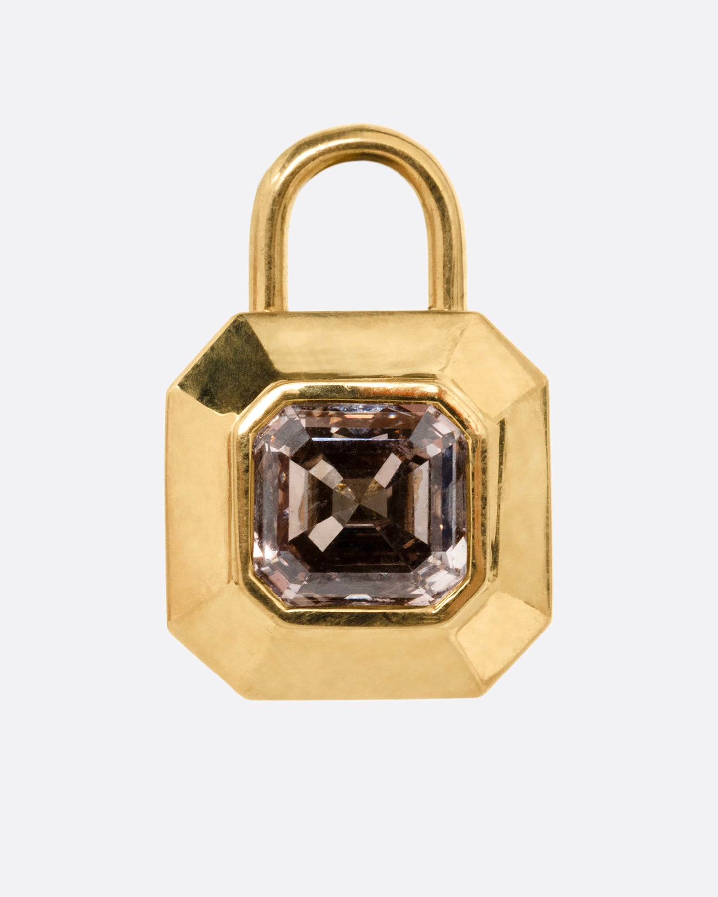 A yellow gold padlock shaped locket with a champagne diamond, shown from the front.