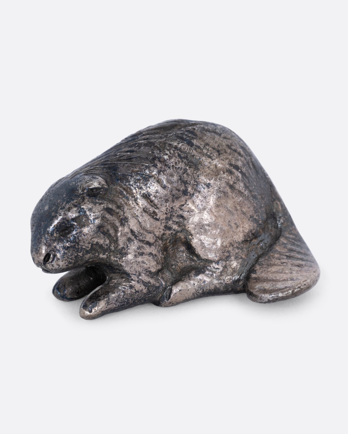 A sterling beaver shown from the side.