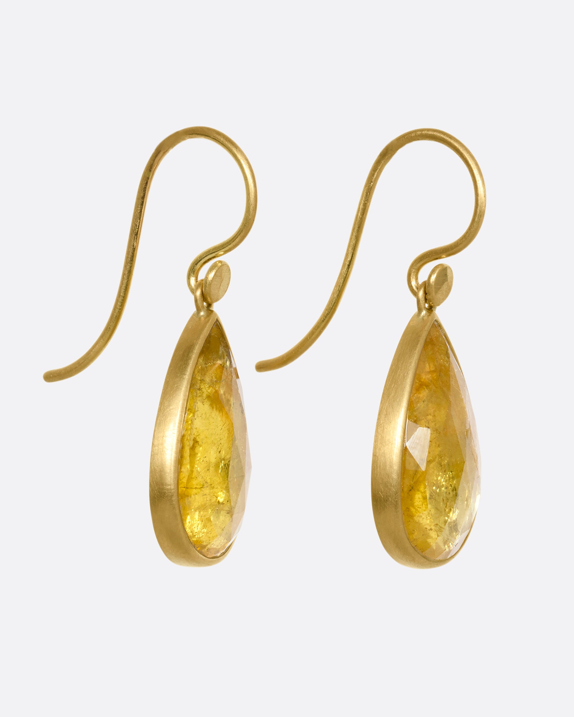 yellow gold yellow tourmaline earrings shown from the side