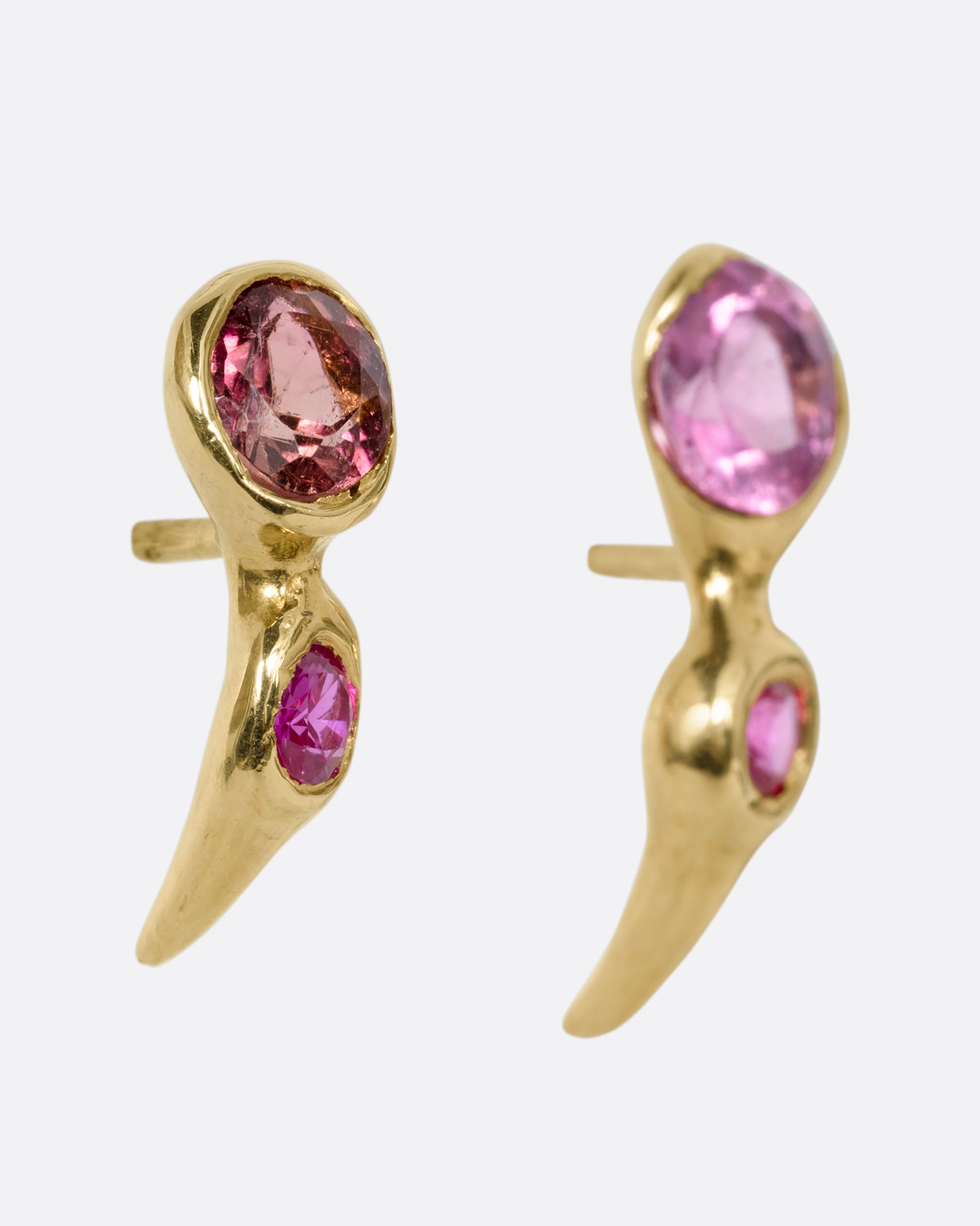 yellow gold earring with ruby and pink tourmalines shown from the side