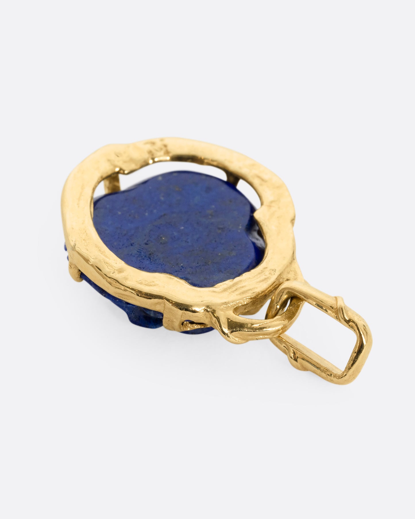 yellow gold rose shaped lapis charm shown from the back