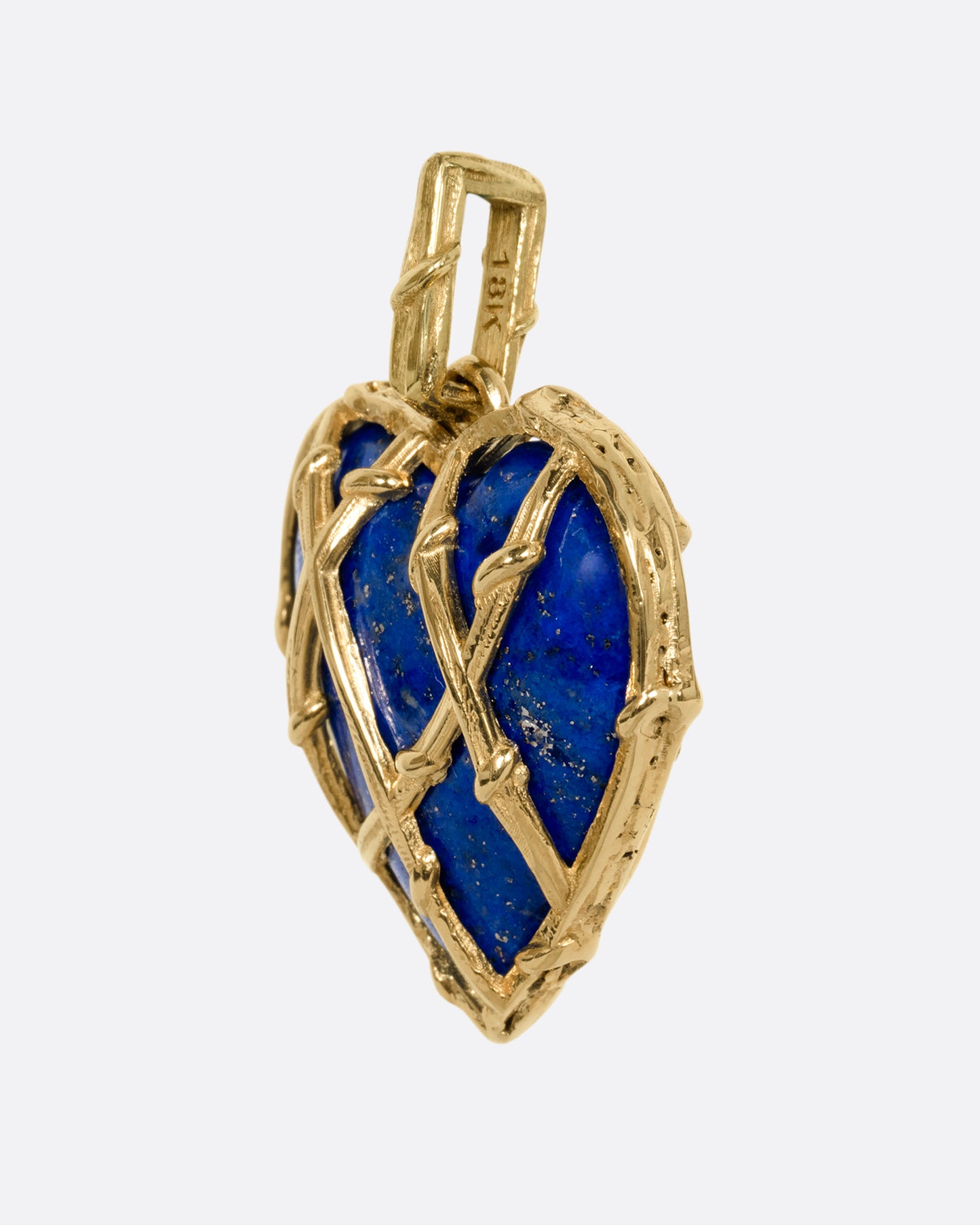 yellow gold heart shaped lapis charm shown from the side