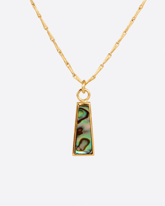 A long abalone trapezoid pendant hangs on a beautiful barley corn chain.