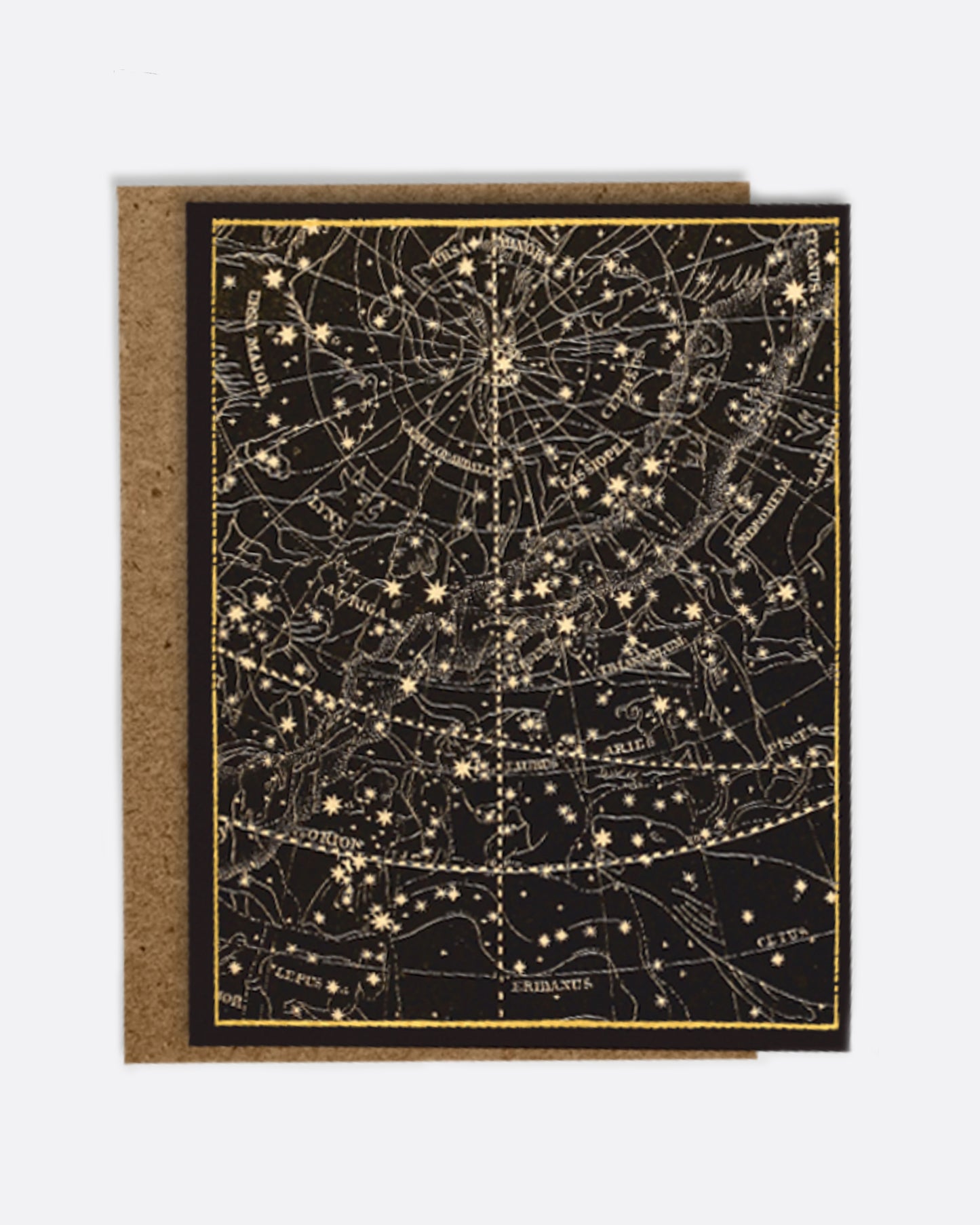 A black paper greeting card with a gold map of the sky on the front, a blank white interior, and a kraft paper envelope.