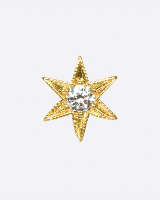 Yellow gold star stud earring with six points and millgrain details.