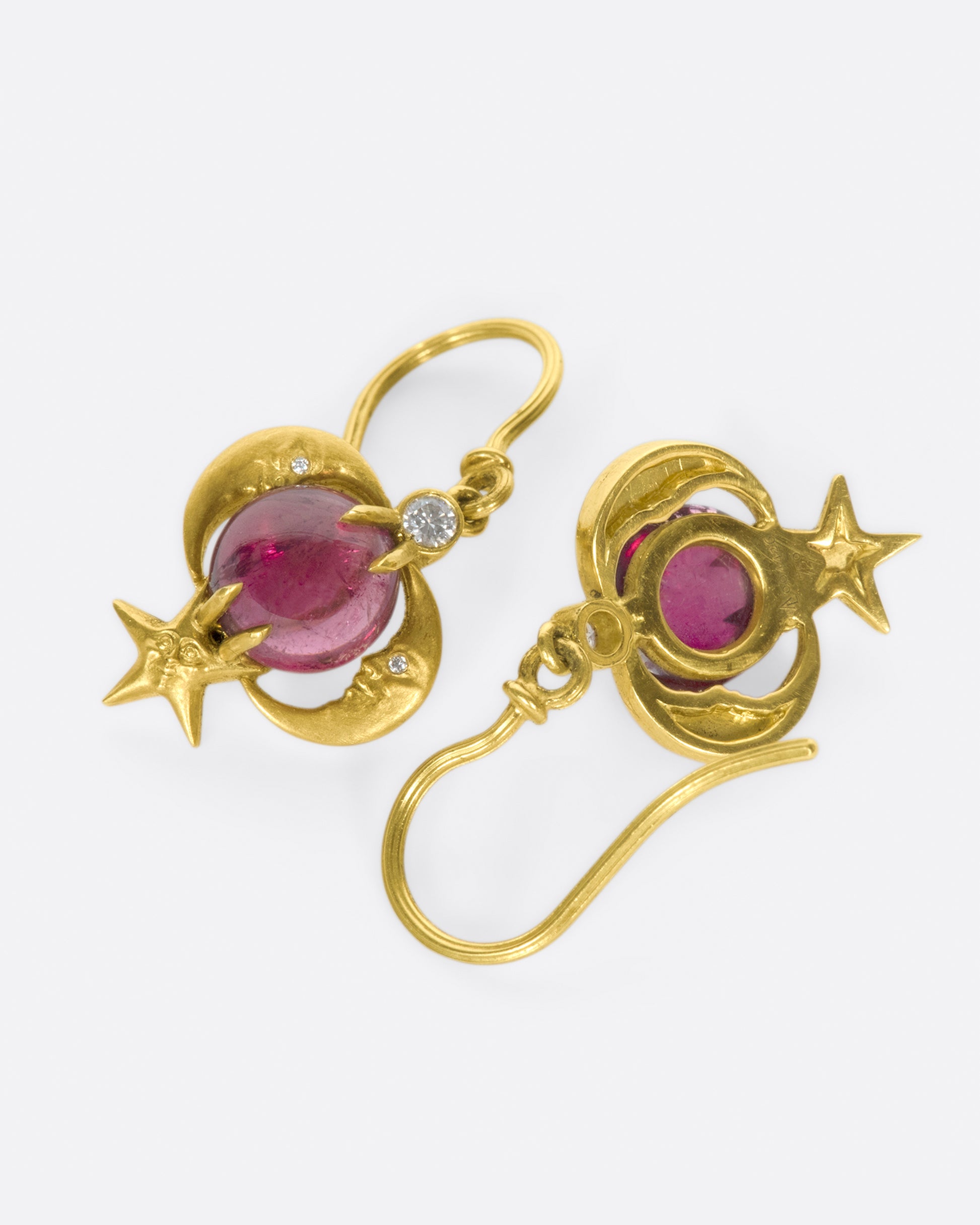 These earrings tell a story about the cosmos; a journey through the heavens and through the history of art.