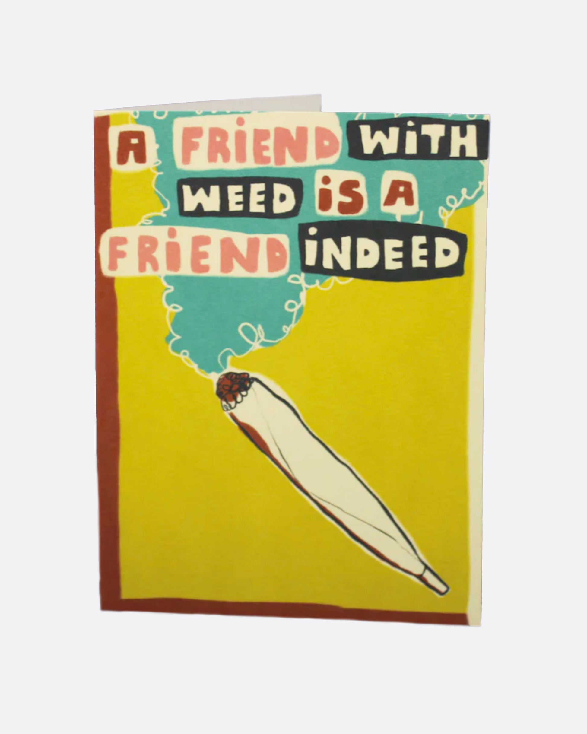 A yellow greeting card with a joint on the front and the words 'A friend with weed is a friend indeed,' and a black white interior.