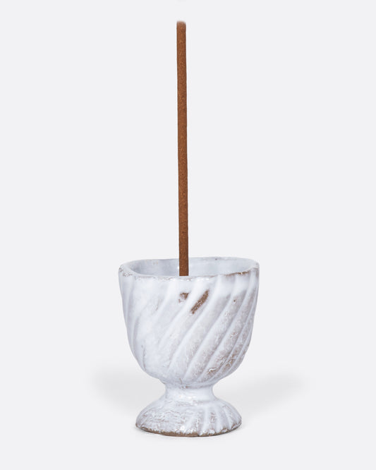 This handmade porcelain incense holder looks like a mini chalice, making it incredibly cute in a cluster of trinkets on a coffee table or nightstand.