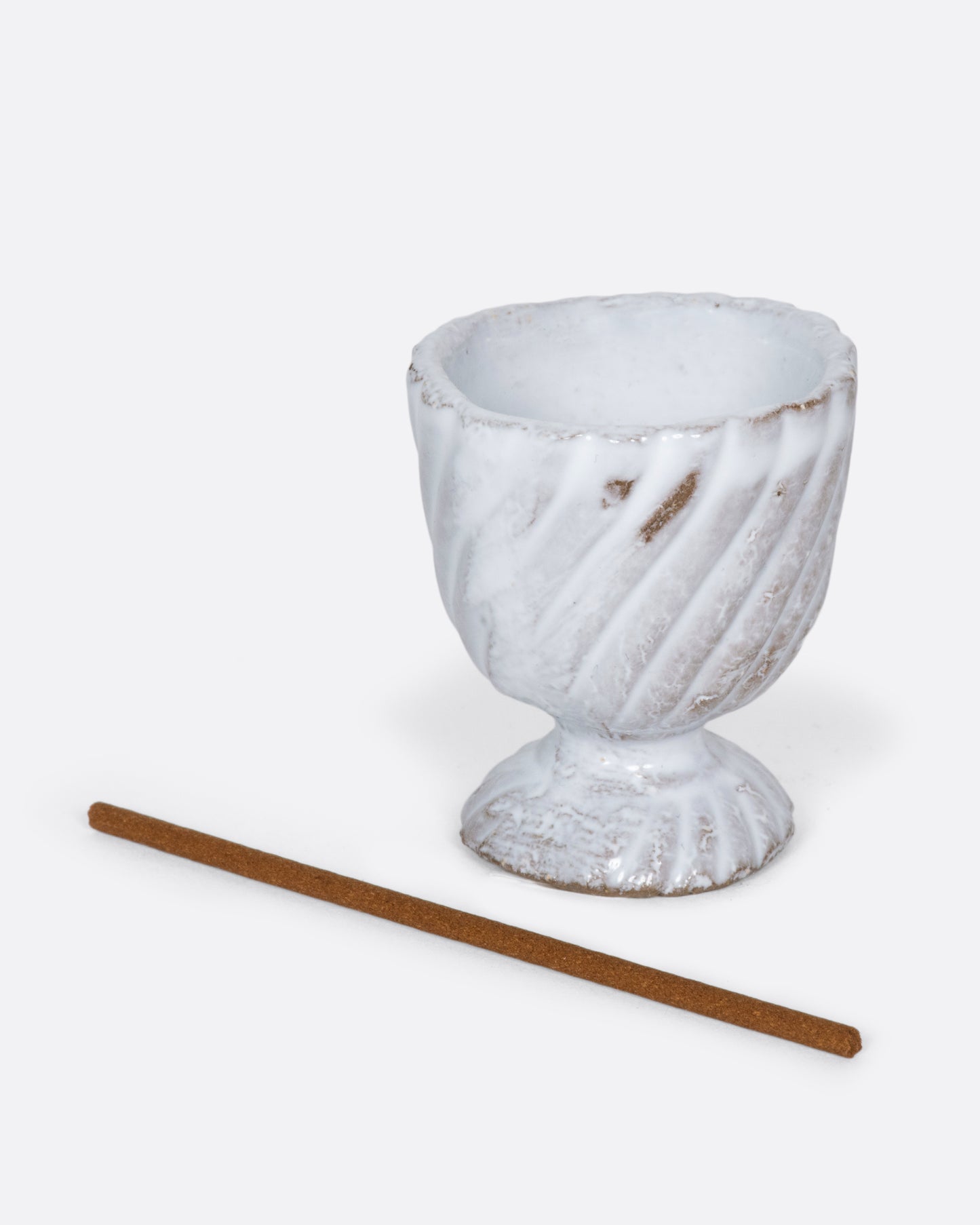 This handmade porcelain incense holder looks like a mini chalice, making it incredibly cute in a cluster of trinkets on a coffee table or nightstand.