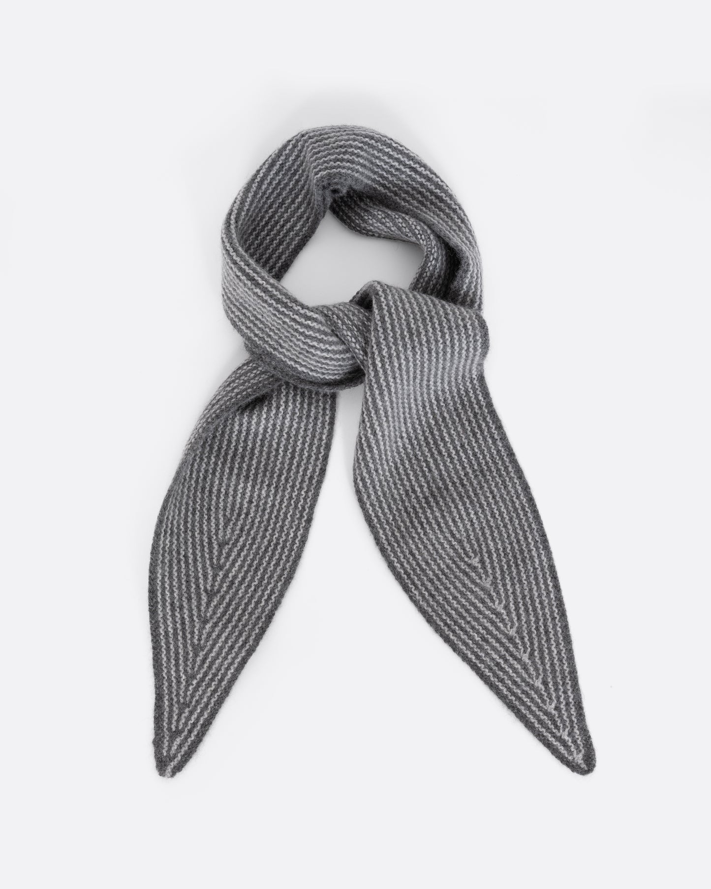 A grey striped cashmere scarf, shown tied.