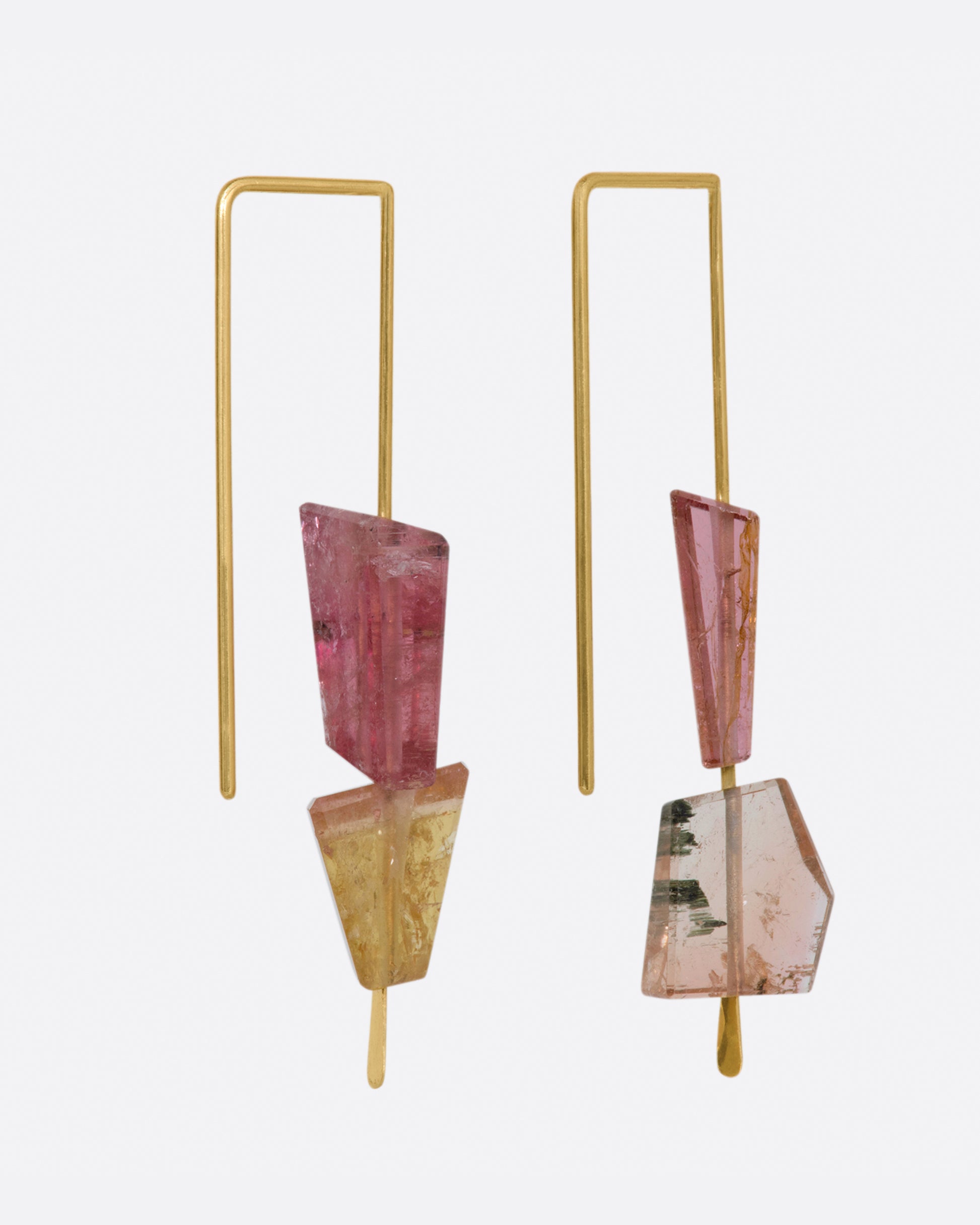 Yellow gold rectangular hook earrings with two pink tourmalines on each. View from the side.