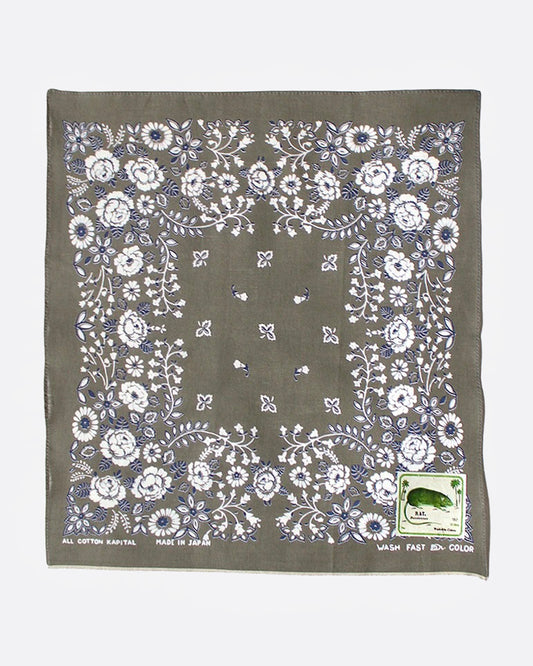 A khaki bandana with a floral print, shown from the front.