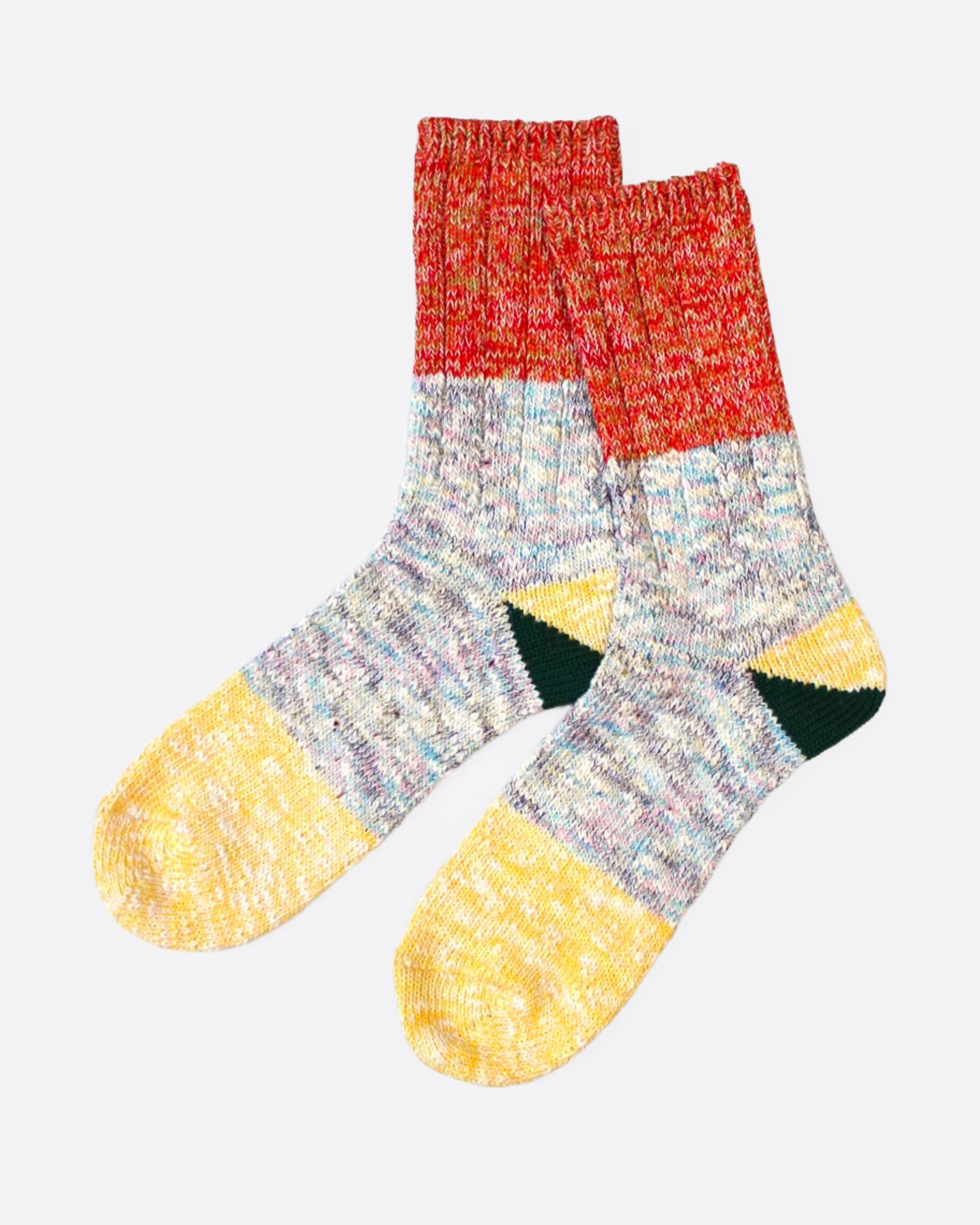A pair of multicolored marl socks with dual-toned heels, shown from the side.