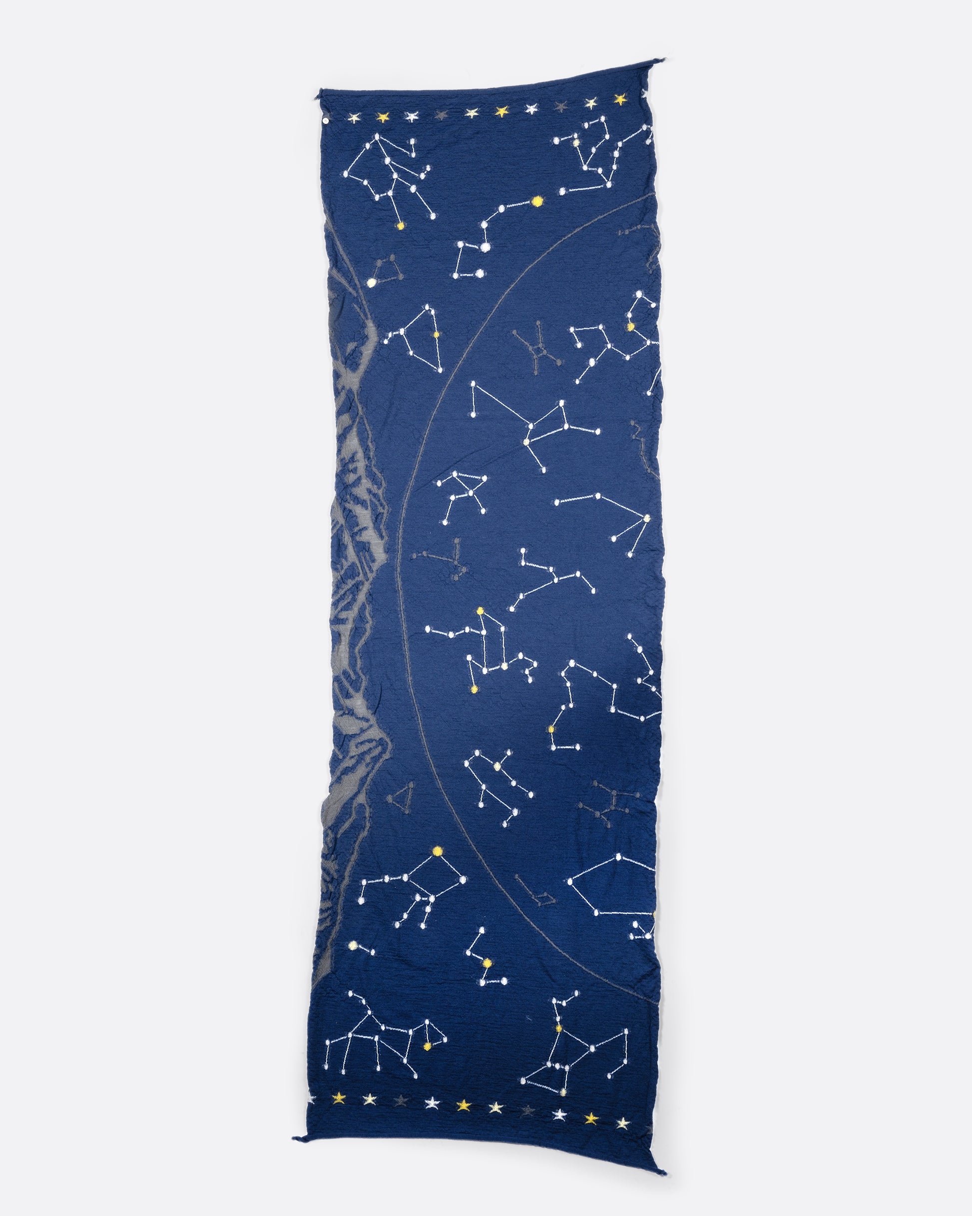 A navy blue scarf with constellations. View laying flat.