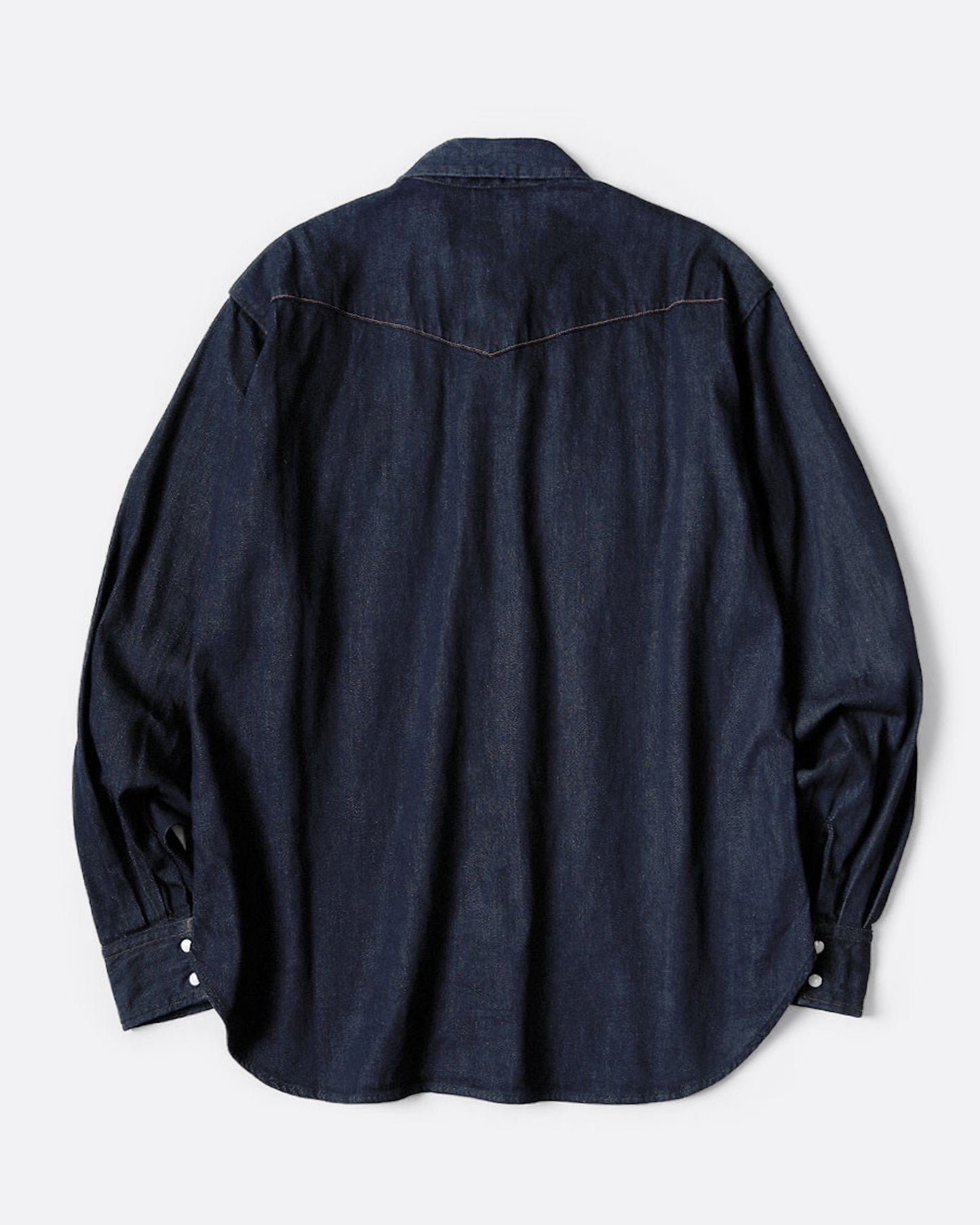 A Western shirt in deep indigo denim, shown from the back.