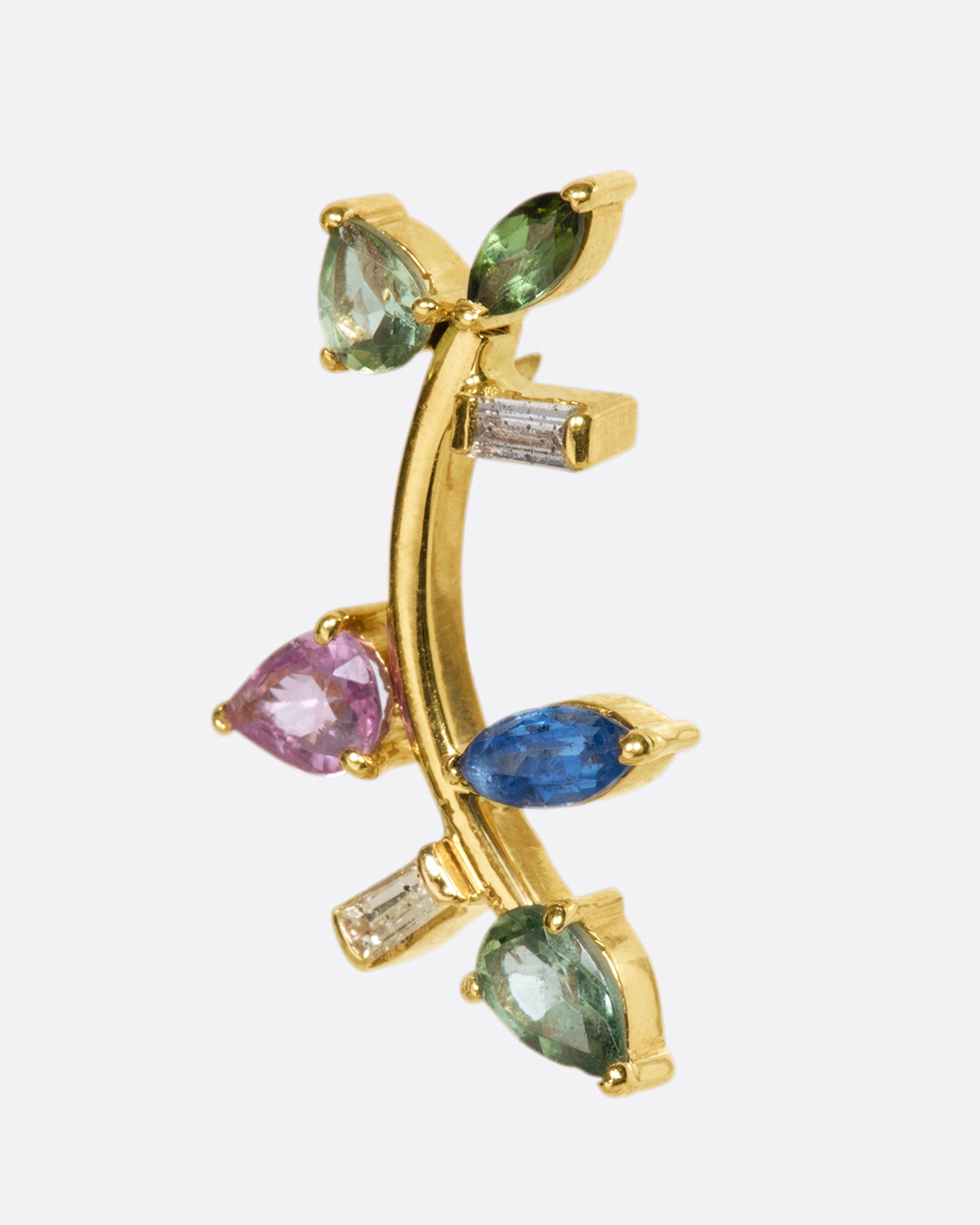 This elegant 14k gold stud, dotted with blue and green gemstones, reminds us of an olive branch