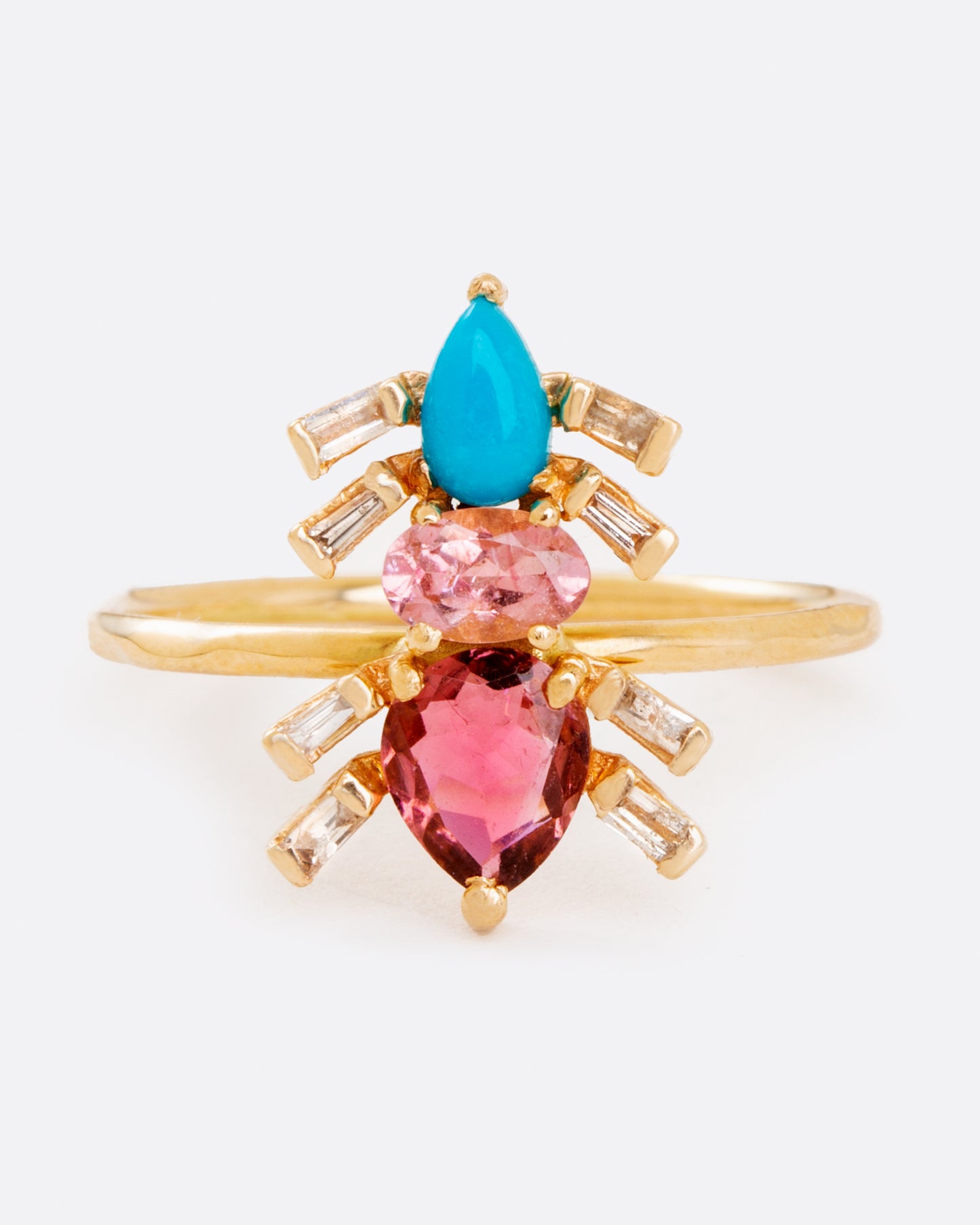 A crystalline critter to crawl on your finger; this composition of pink tourmalines, turquoise, and diamonds forms an elegant ant.