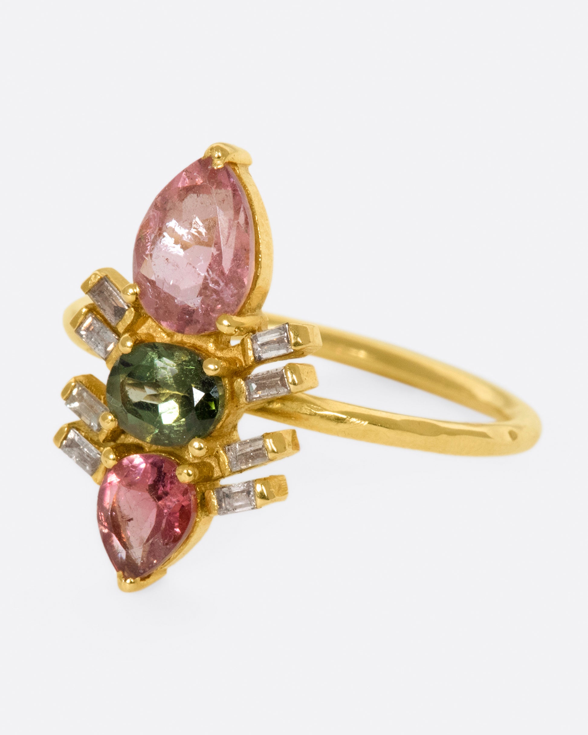 A garden-inspired pink and green tourmaline ring with baguette accents