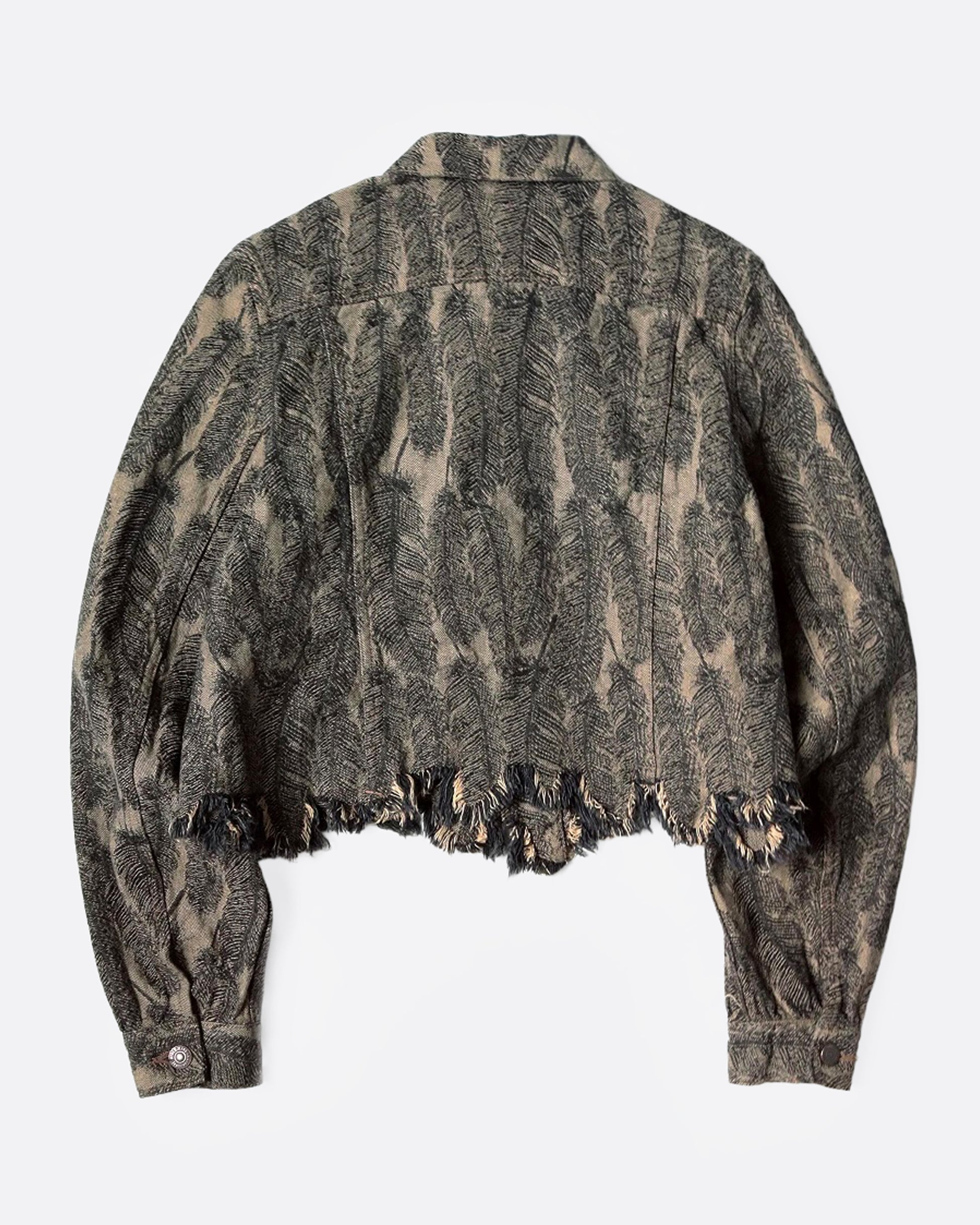 A black and beige jacquard denim jacket with an all-over 3D feather motif and a cut-off hemline and raw feathered seam. Shown from the back.