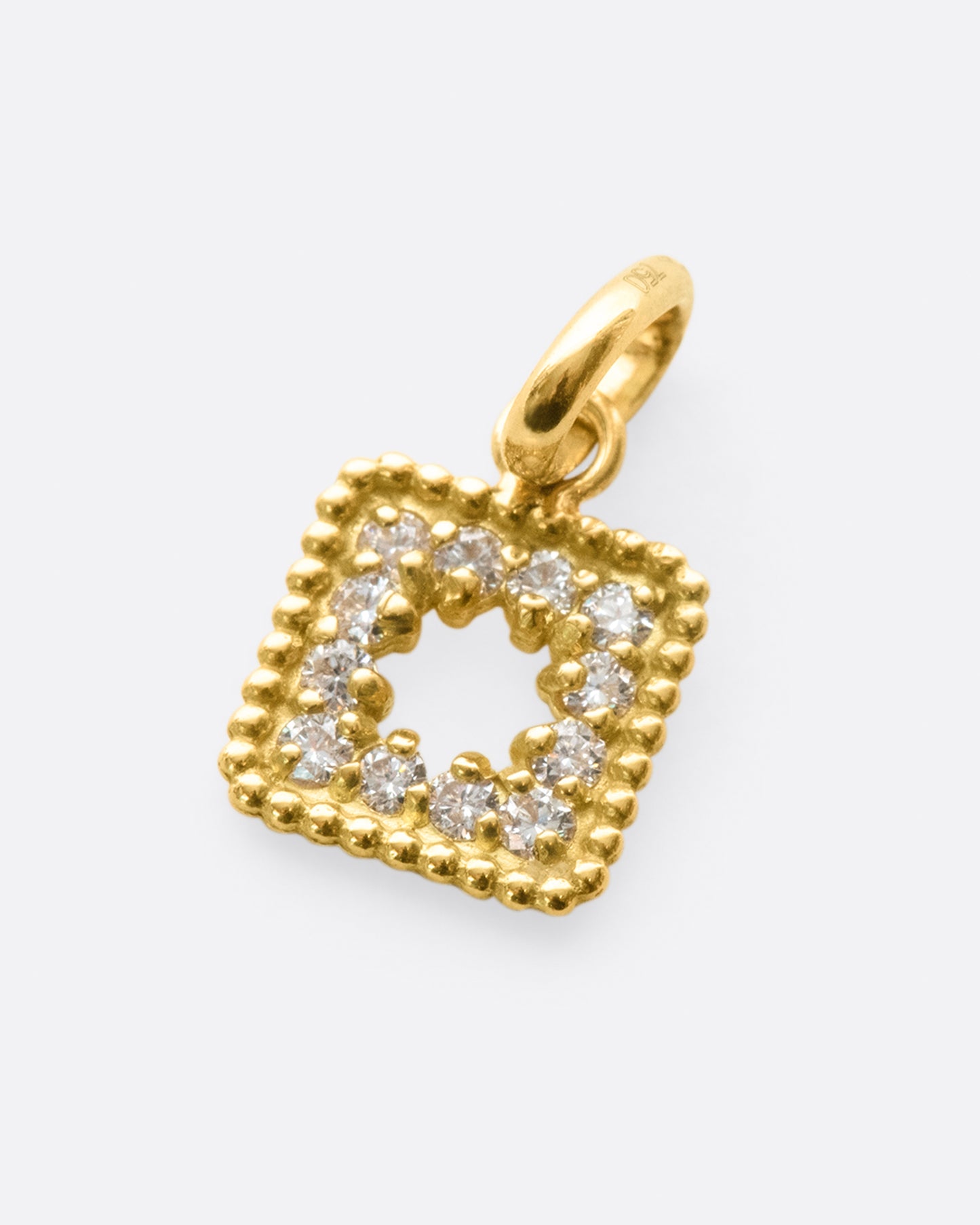 A little window pendant lined with twelve diamonds.