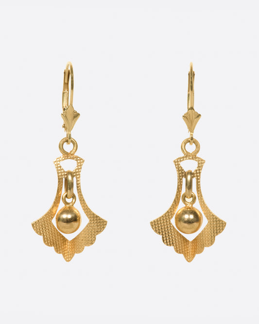 A pair of leverback earrings whose drops have great motion and sparkle just enough in the sun.