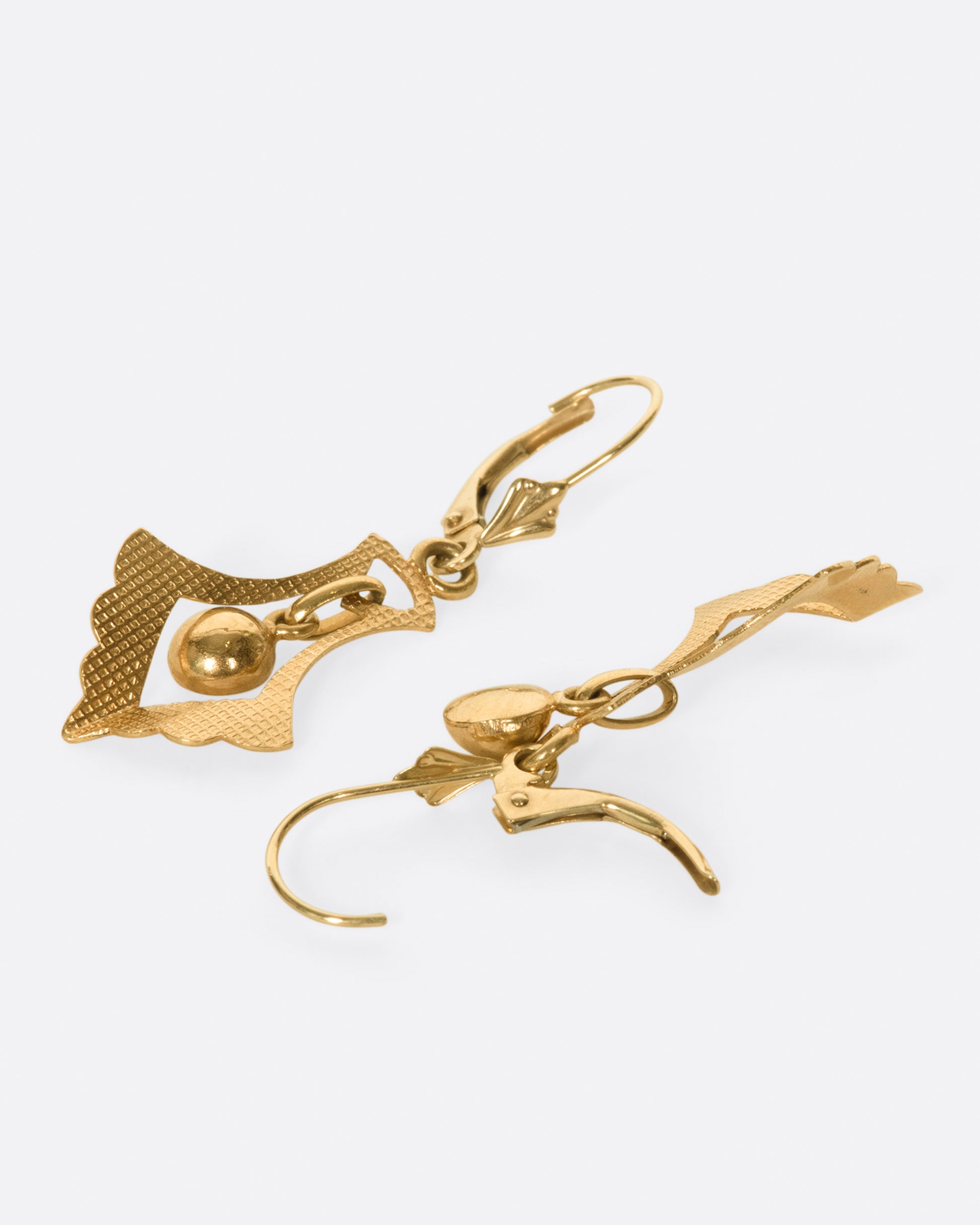 A pair of leverback earrings whose drops have great motion and sparkle just enough in the sun.