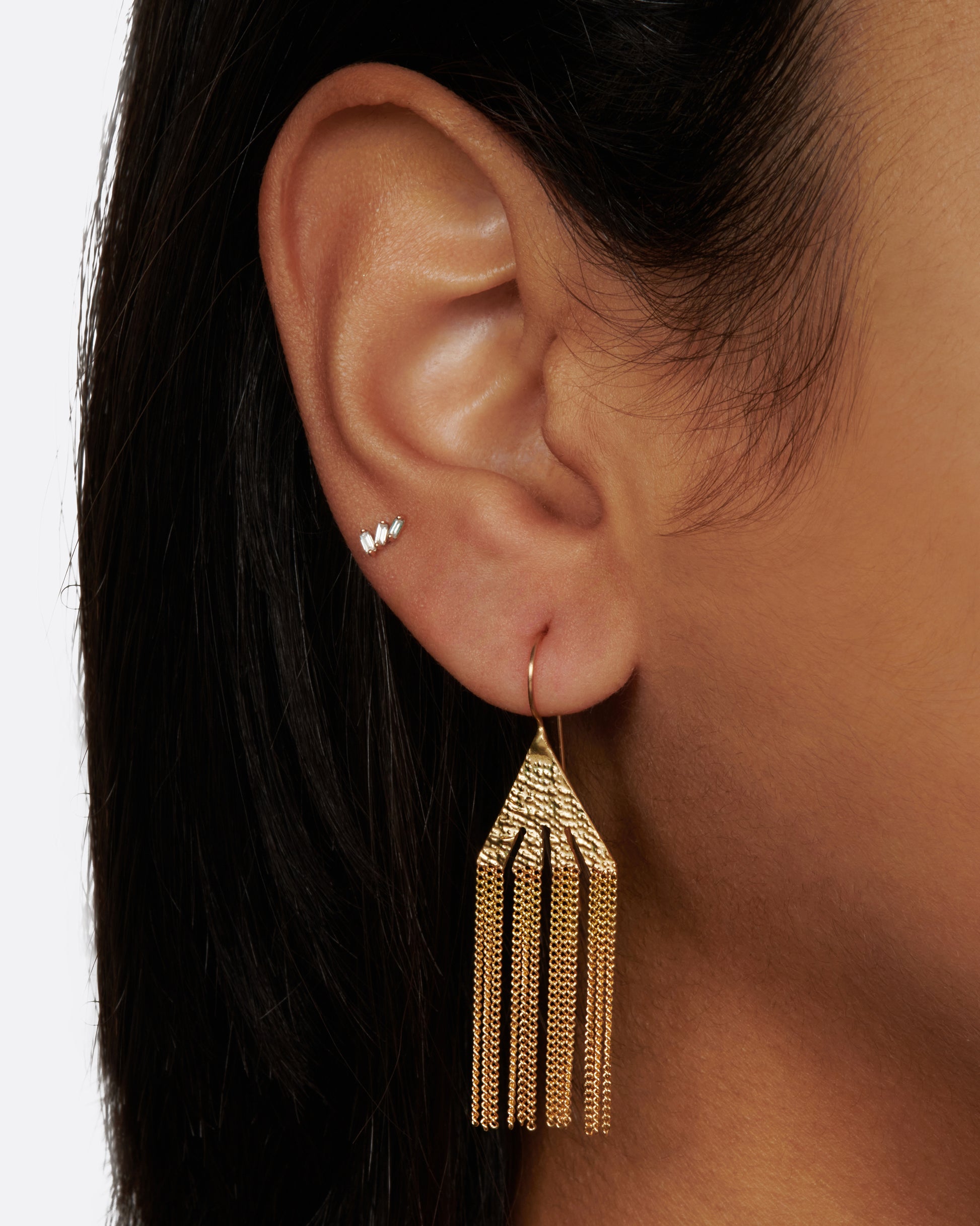 A pair of earrings made of chains with free flowing drops that hang like icicles.