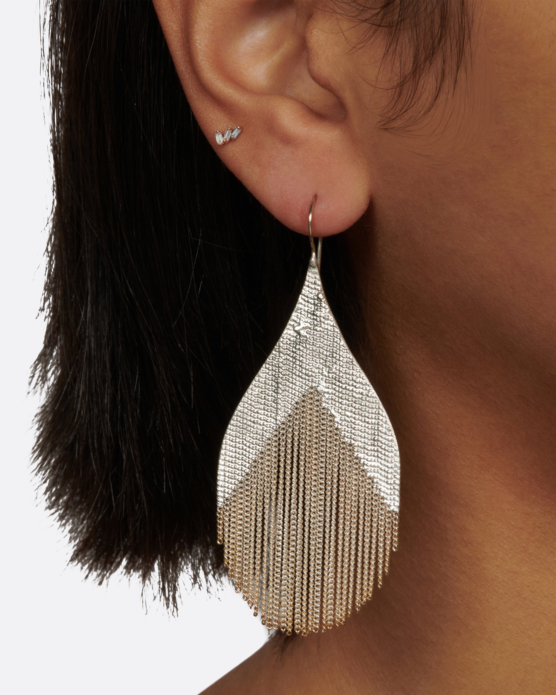 Sterling silver hook earrings with loose multi-strand chains and silver soldered edges. 