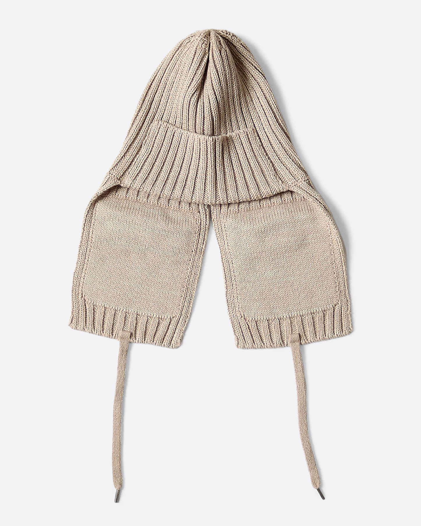 A beige knit hat with ear flaps and pockets. View from the back.