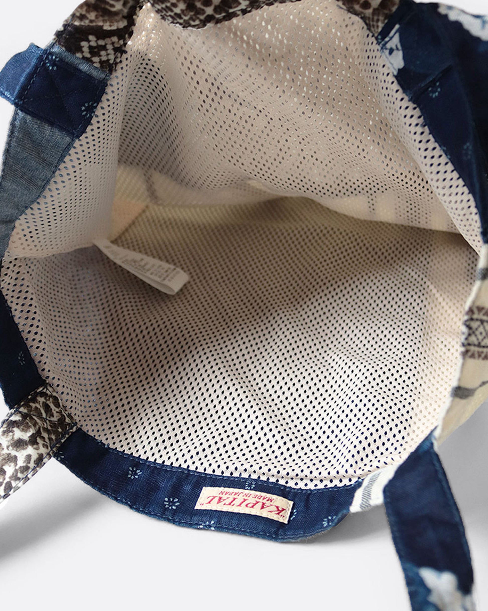 The inside of a A patchwork tote bag shown from the top.